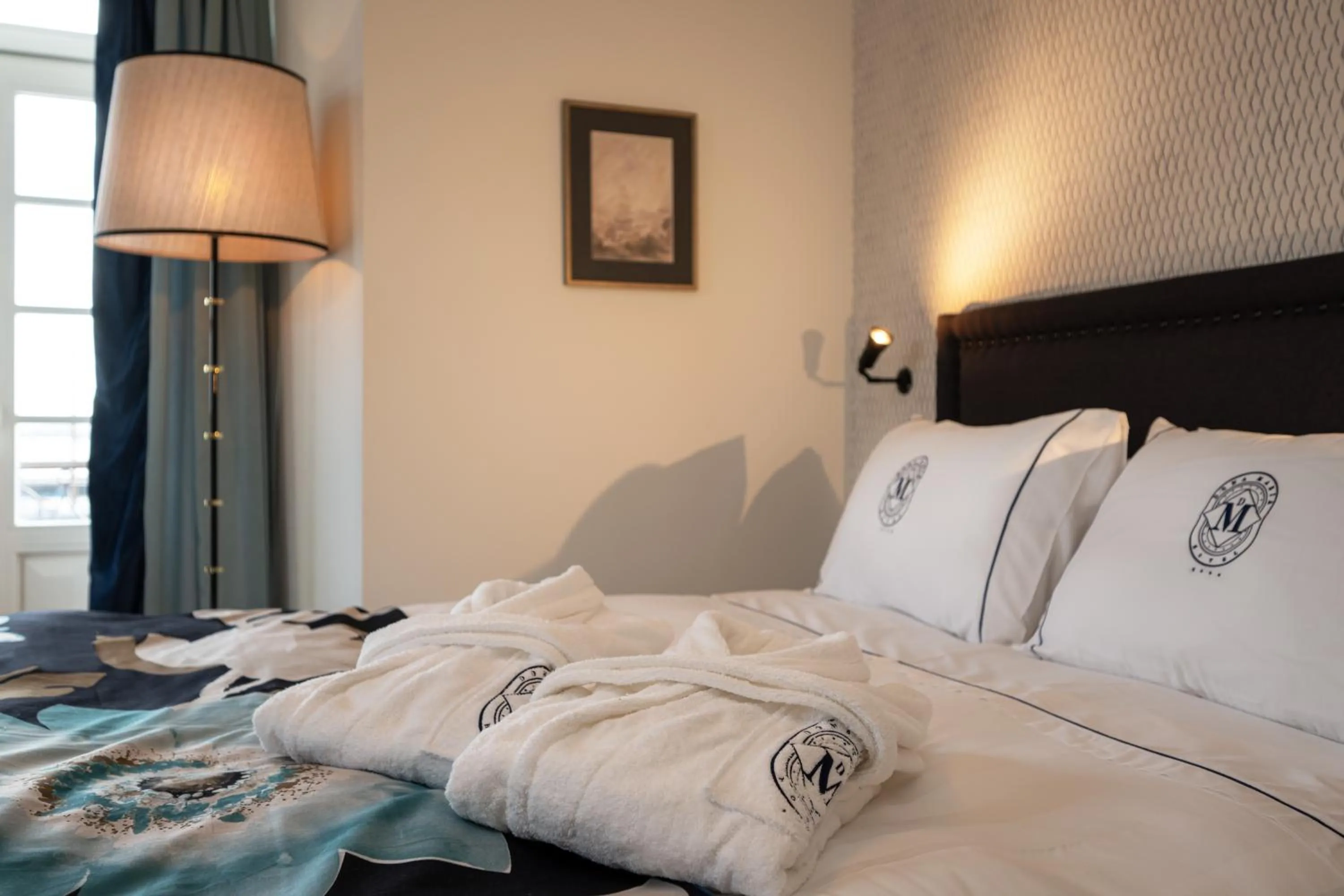 Bed in Dona Maria Hotel