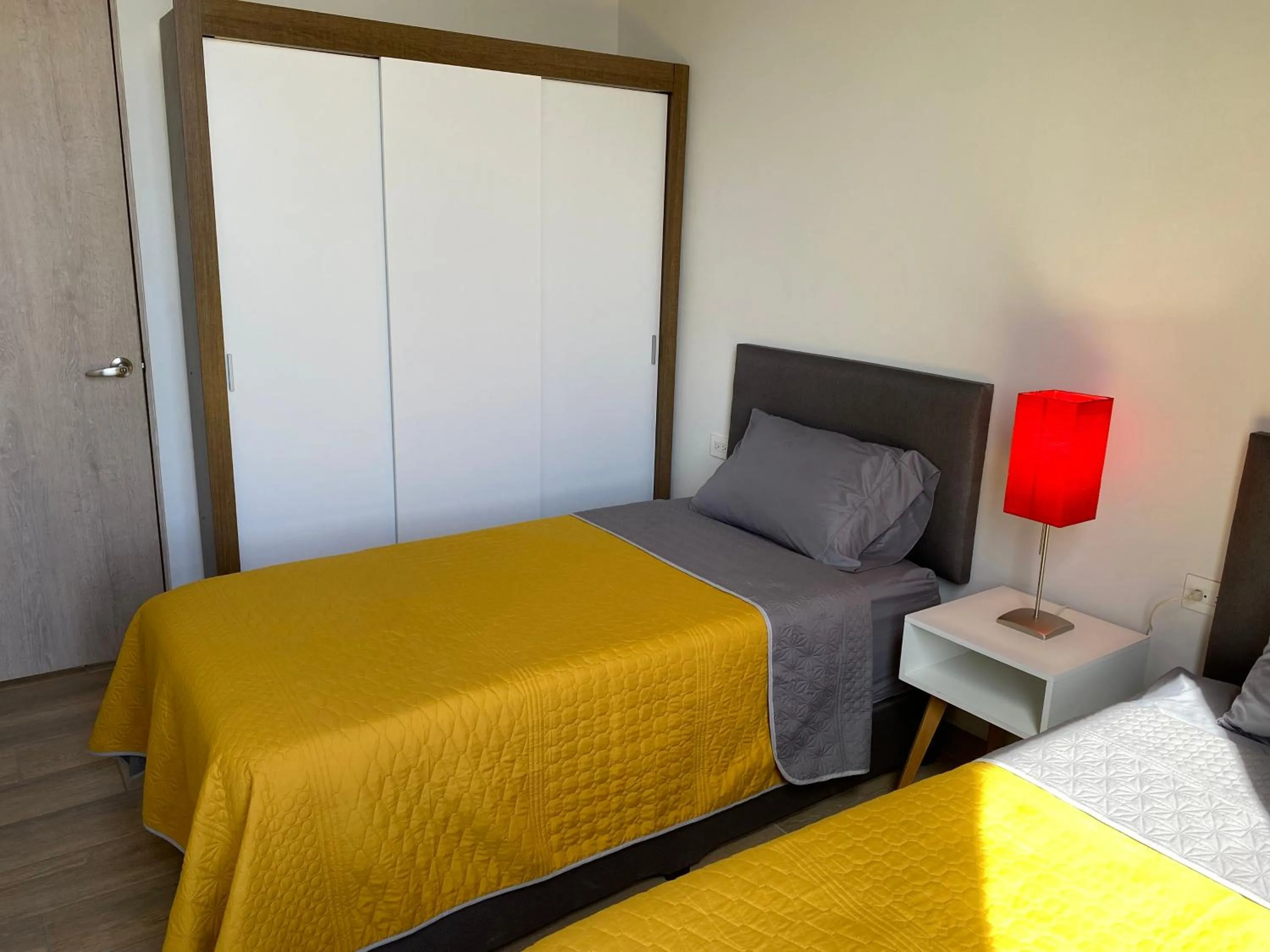 Bed in Lux 2 bedroom apartment, swimming pool, gym and free parking spot in Macro Plaza area
