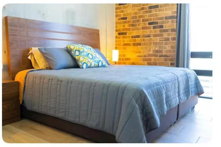 Bed in Lux 2 bedroom apartment, swimming pool, gym and free parking spot in Macro Plaza area