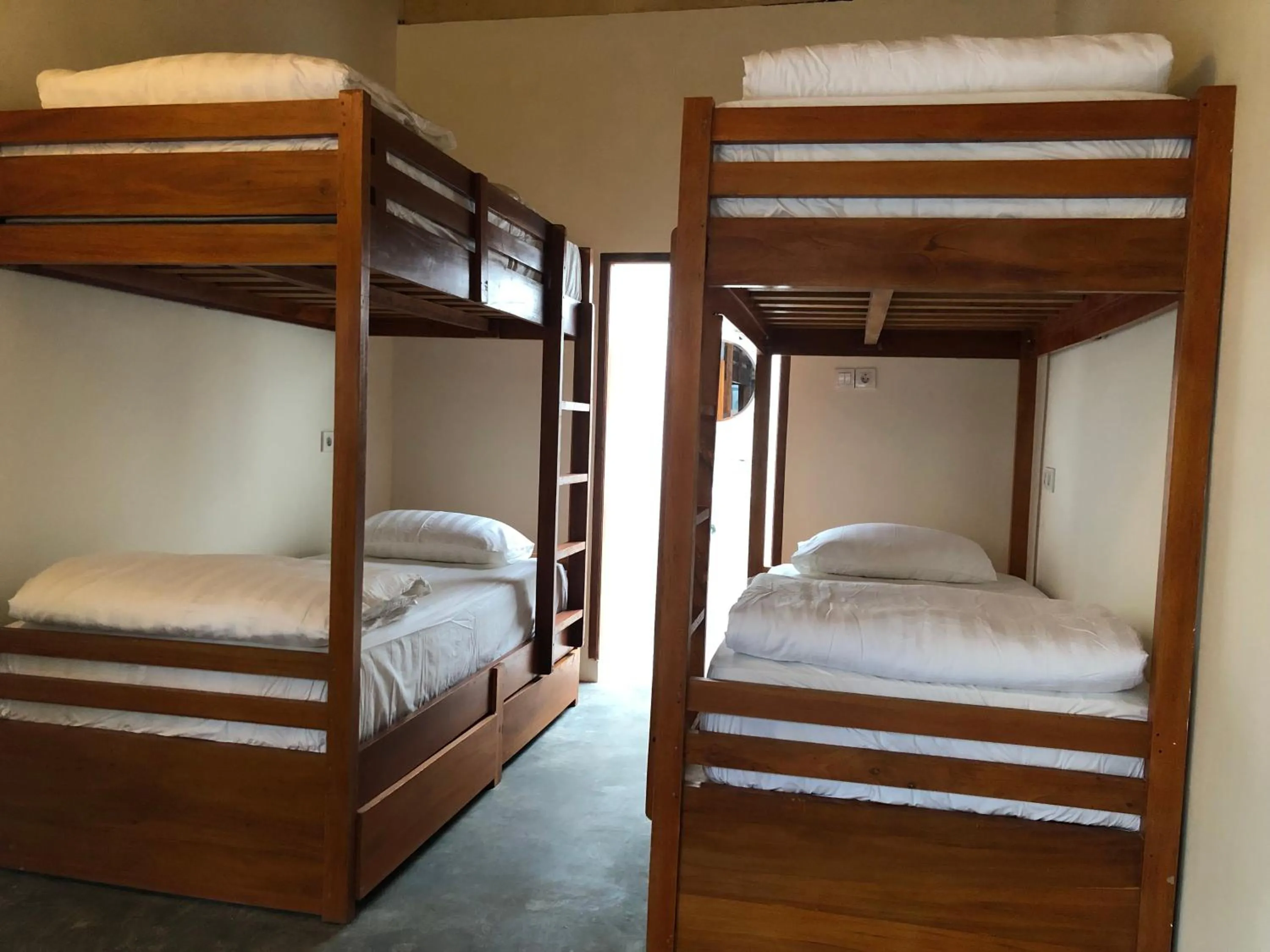 Bed in Roots Hotel Trawangan