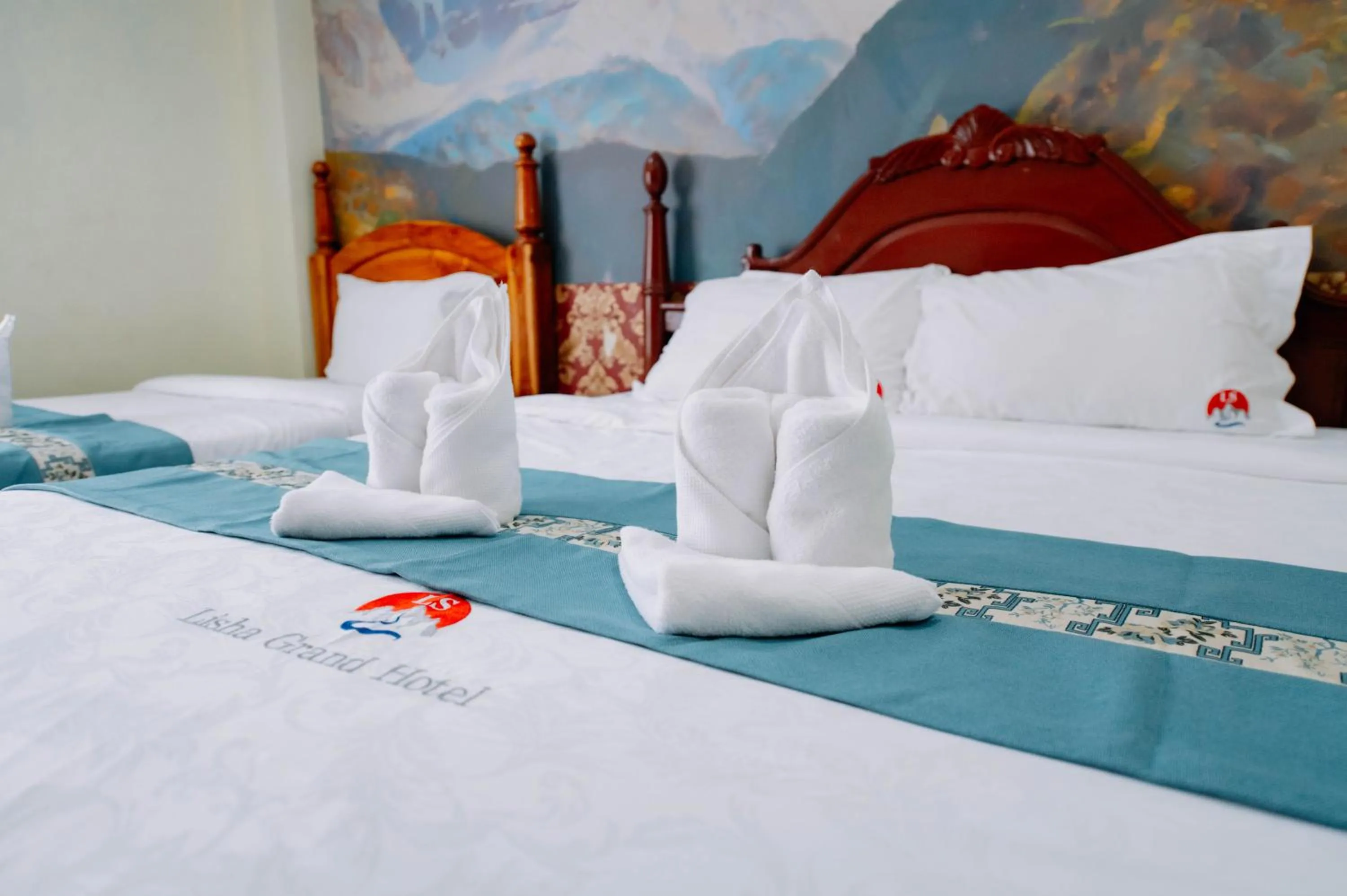 Bed in Lisha Roungnakhone Hotel