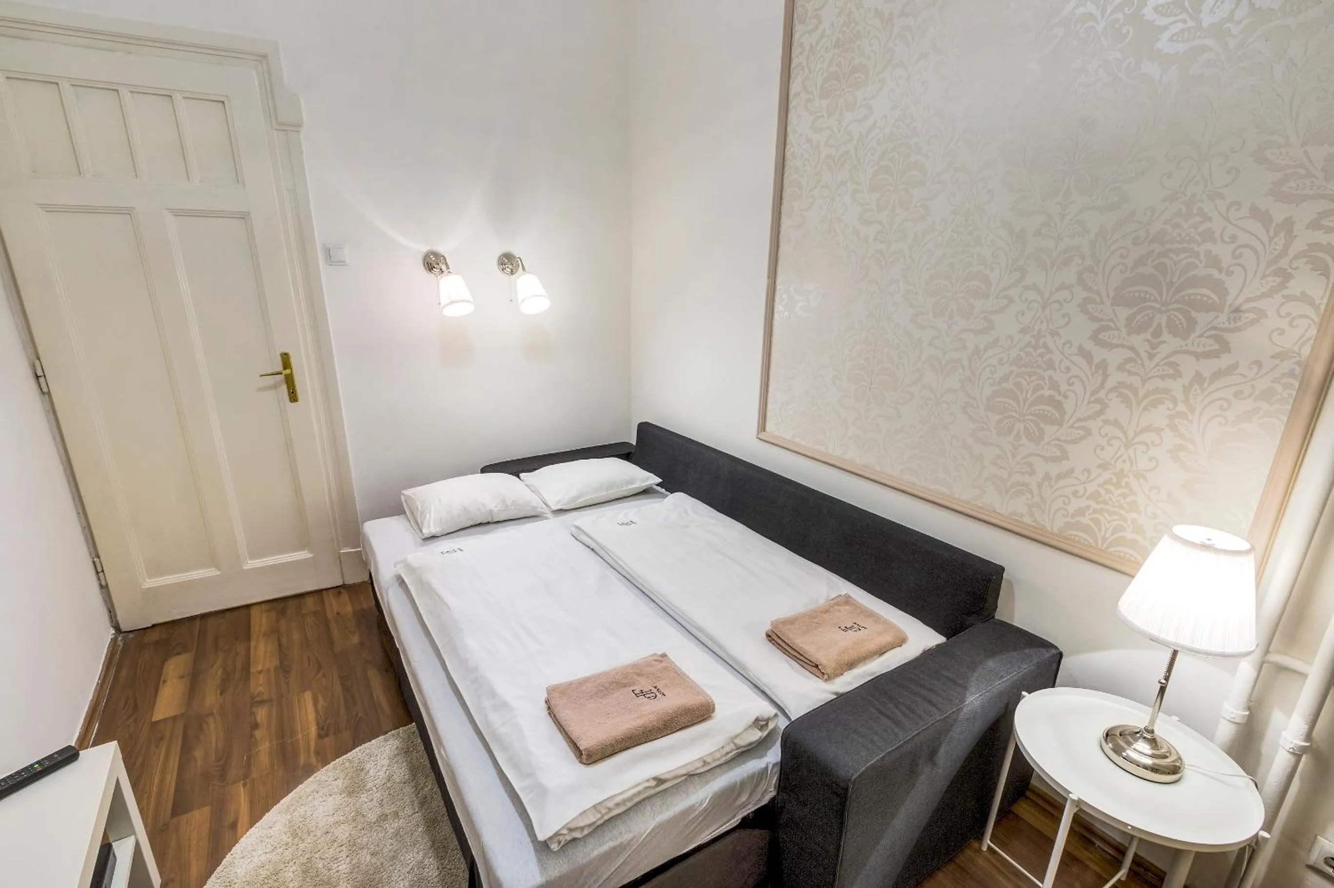 Living room, Bed in Fashion Street Luxury Apartment