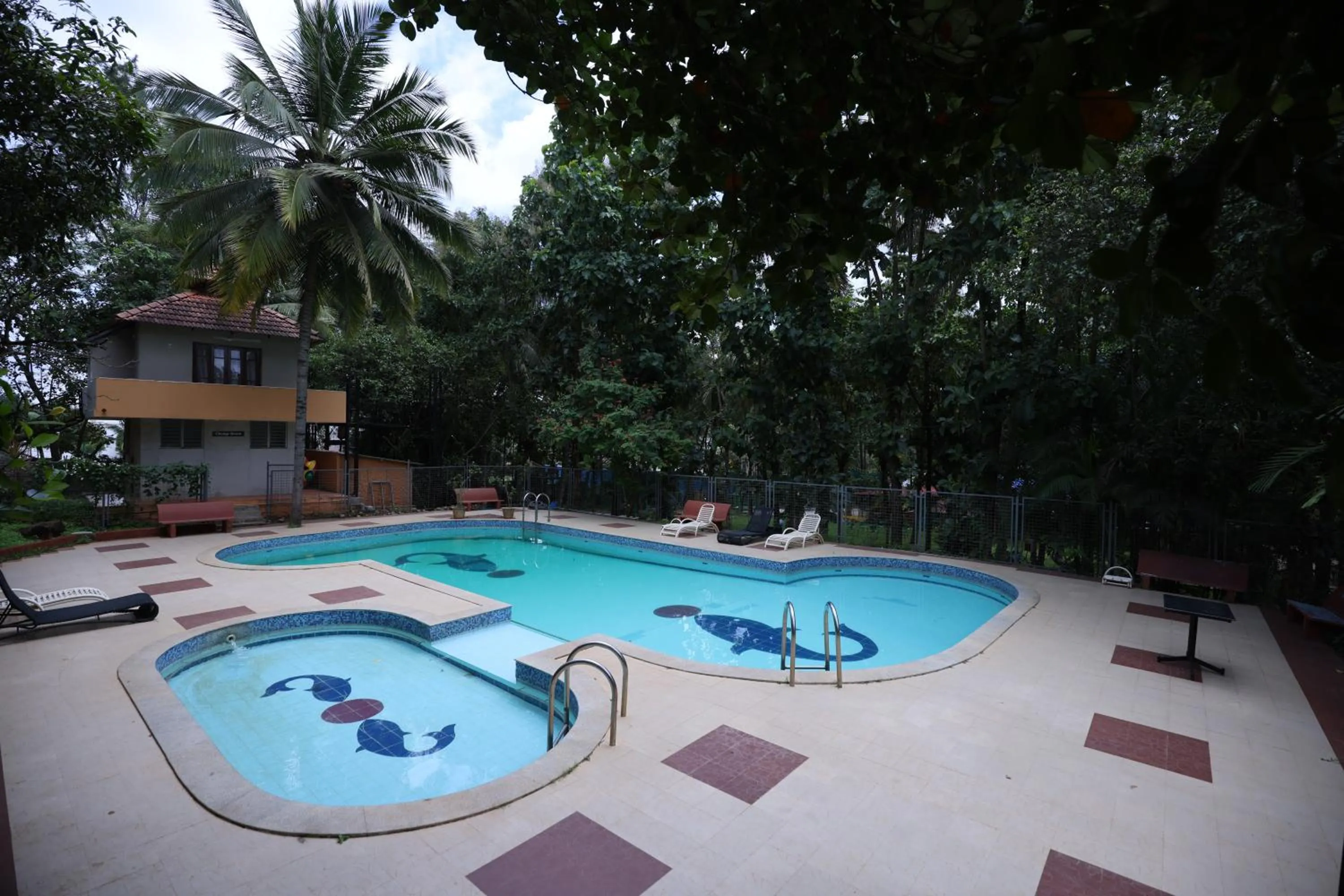 Swimming pool in Nisarga Resort