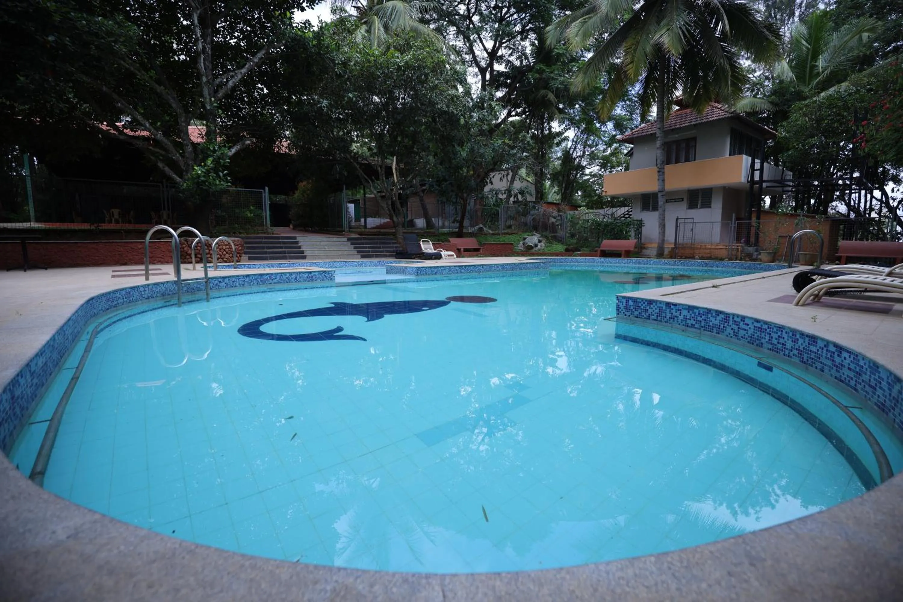 Swimming pool in Nisarga Resort