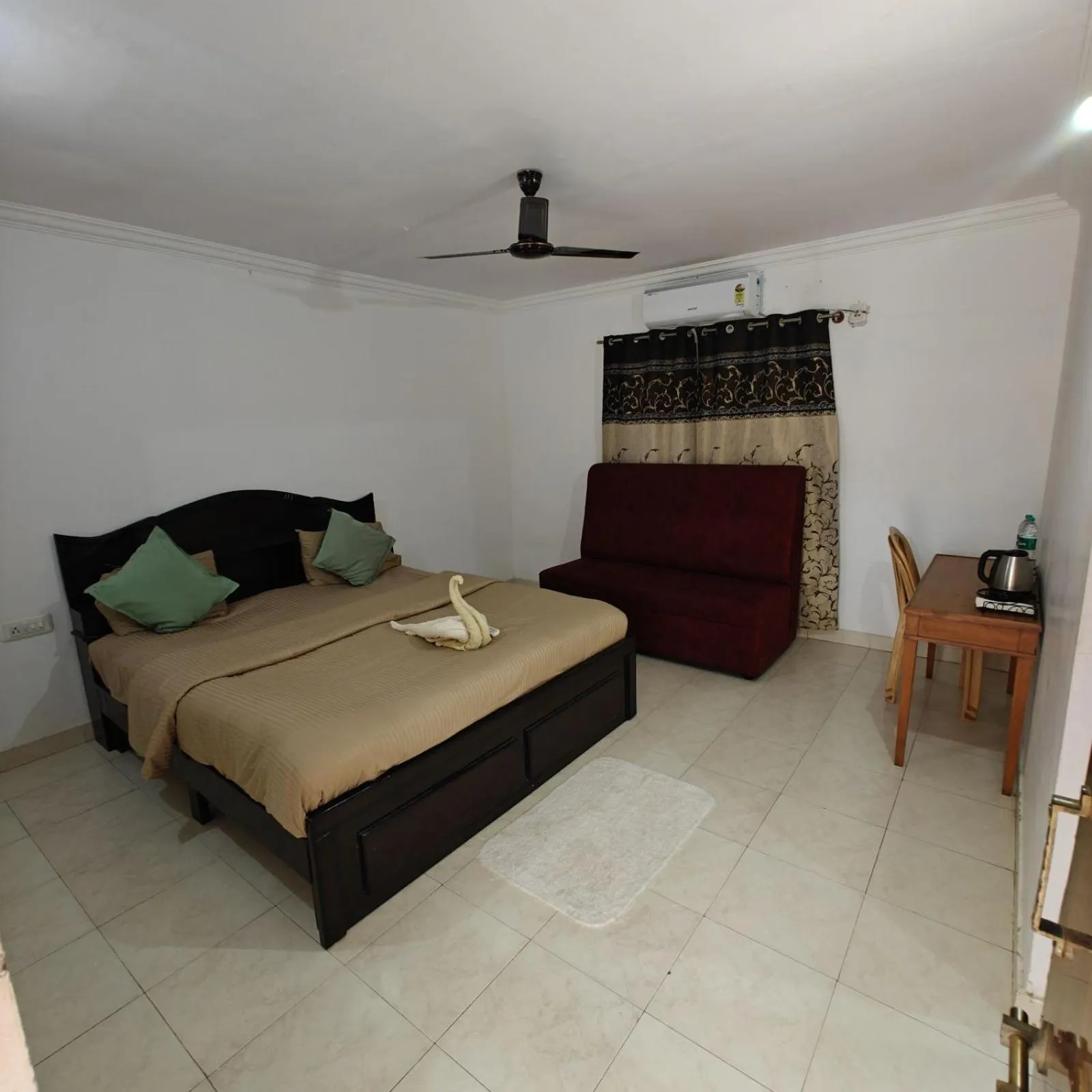 Bed in Nisarga Resort