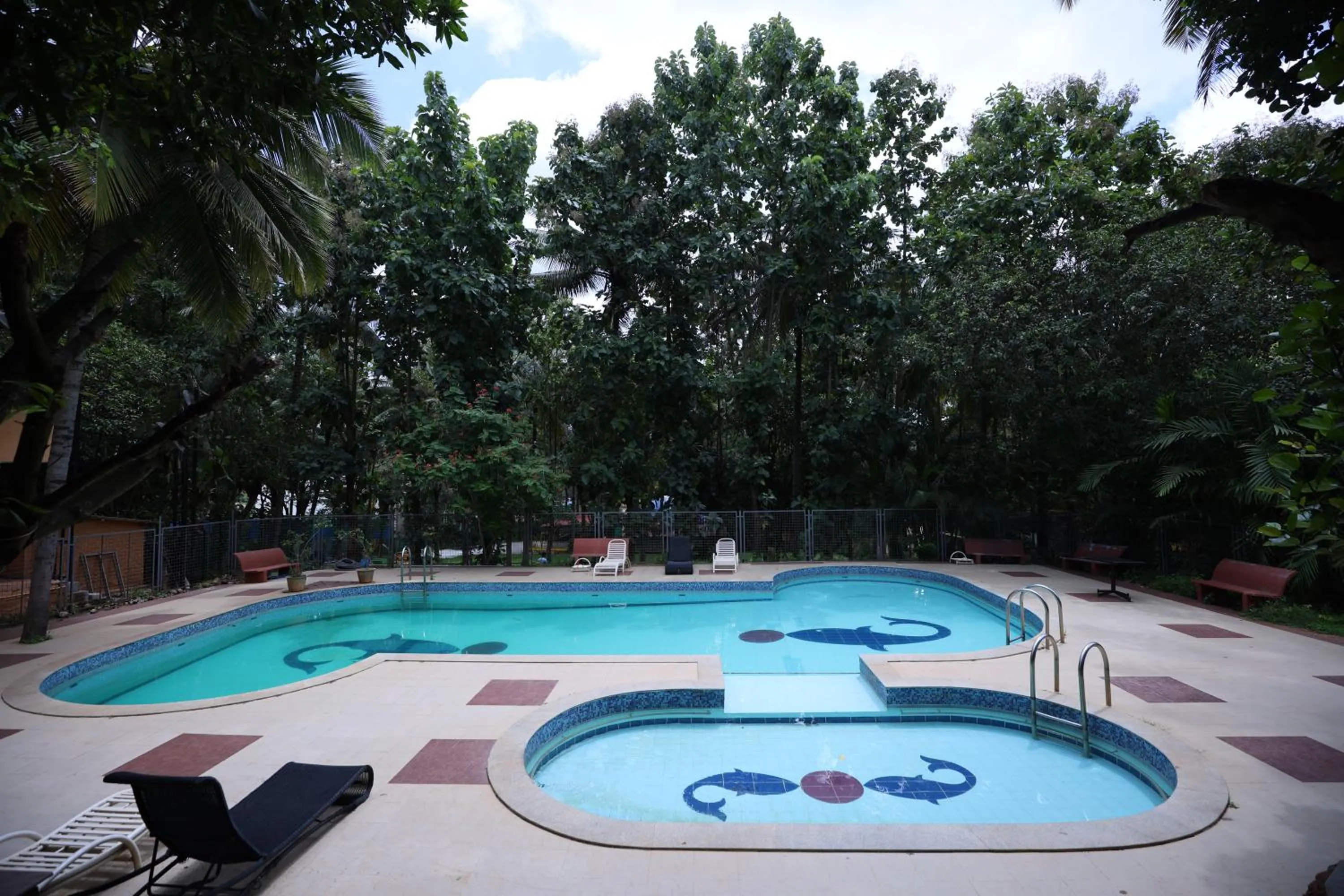 Swimming pool in Nisarga Resort