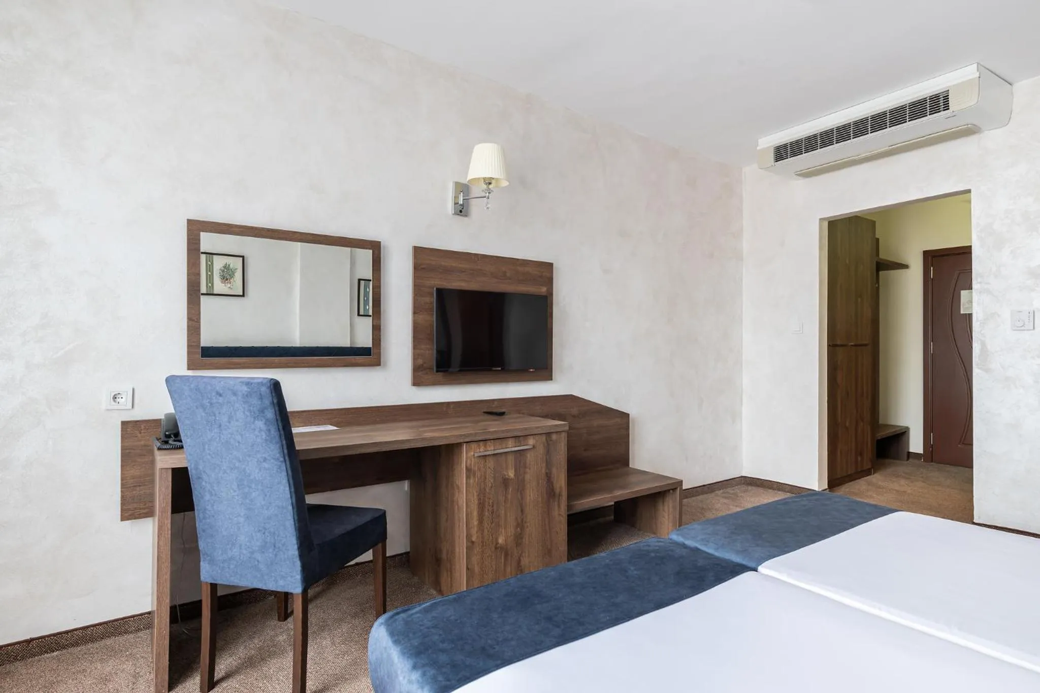 Bed in Flamingo Beach Hotel