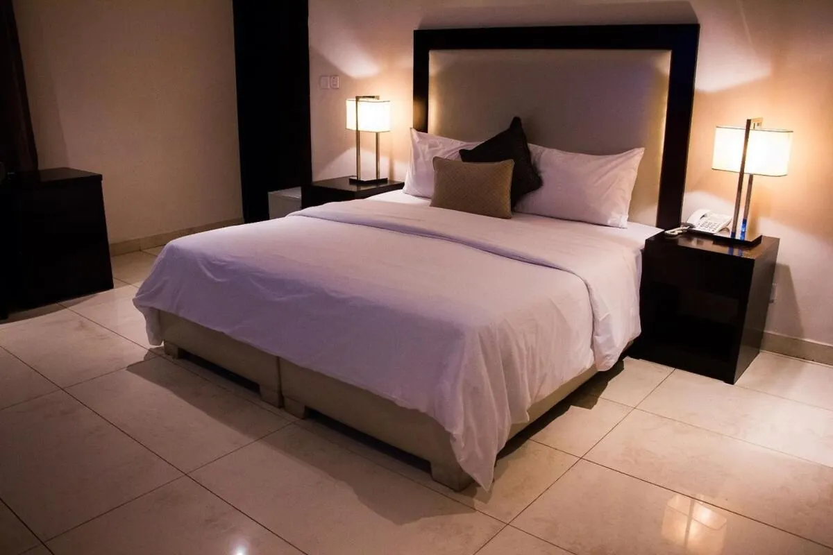 Bed in S & S Hotel & Suites