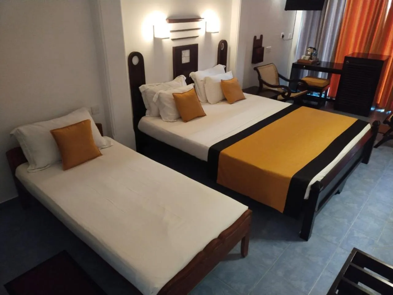 Bed in DALAWELLA BEACH RESORT