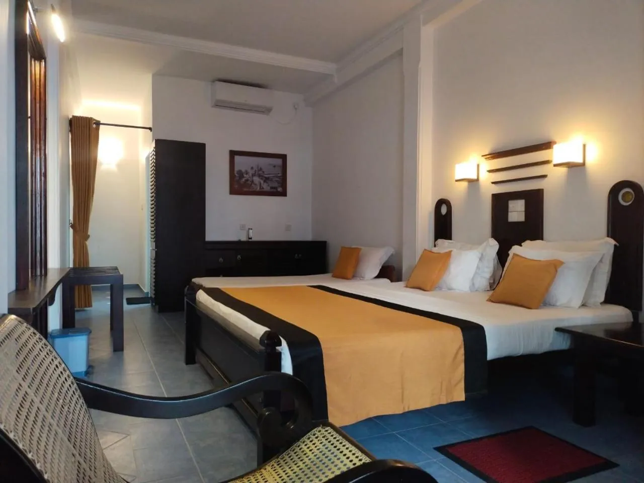 Photo of the whole room, Bed in DALAWELLA BEACH RESORT