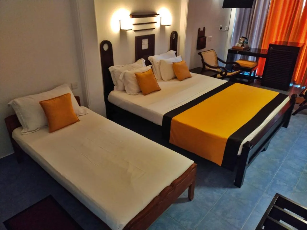 Bed in DALAWELLA BEACH RESORT