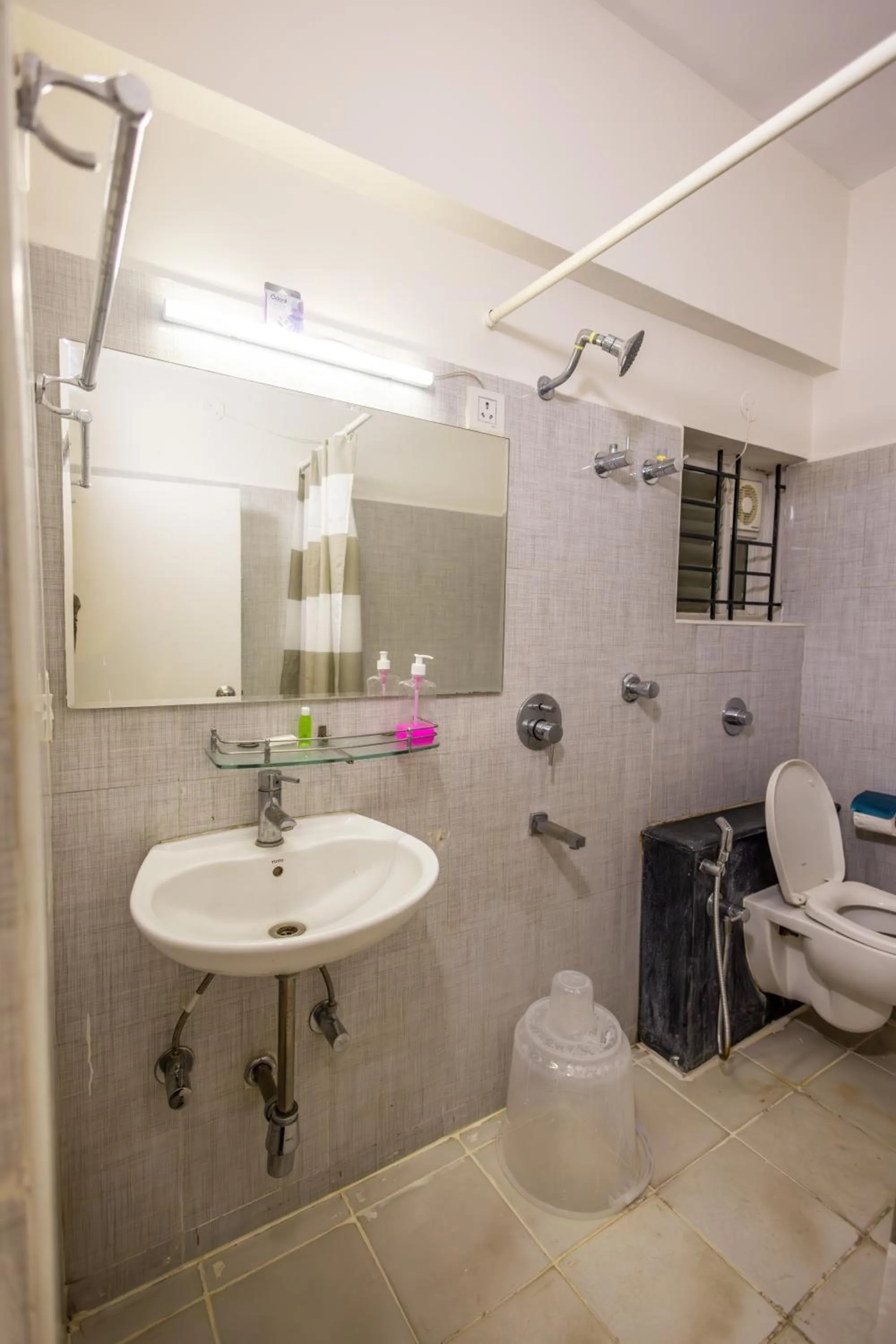 Bathroom in Suraksha Stay Brookfield Hotel
