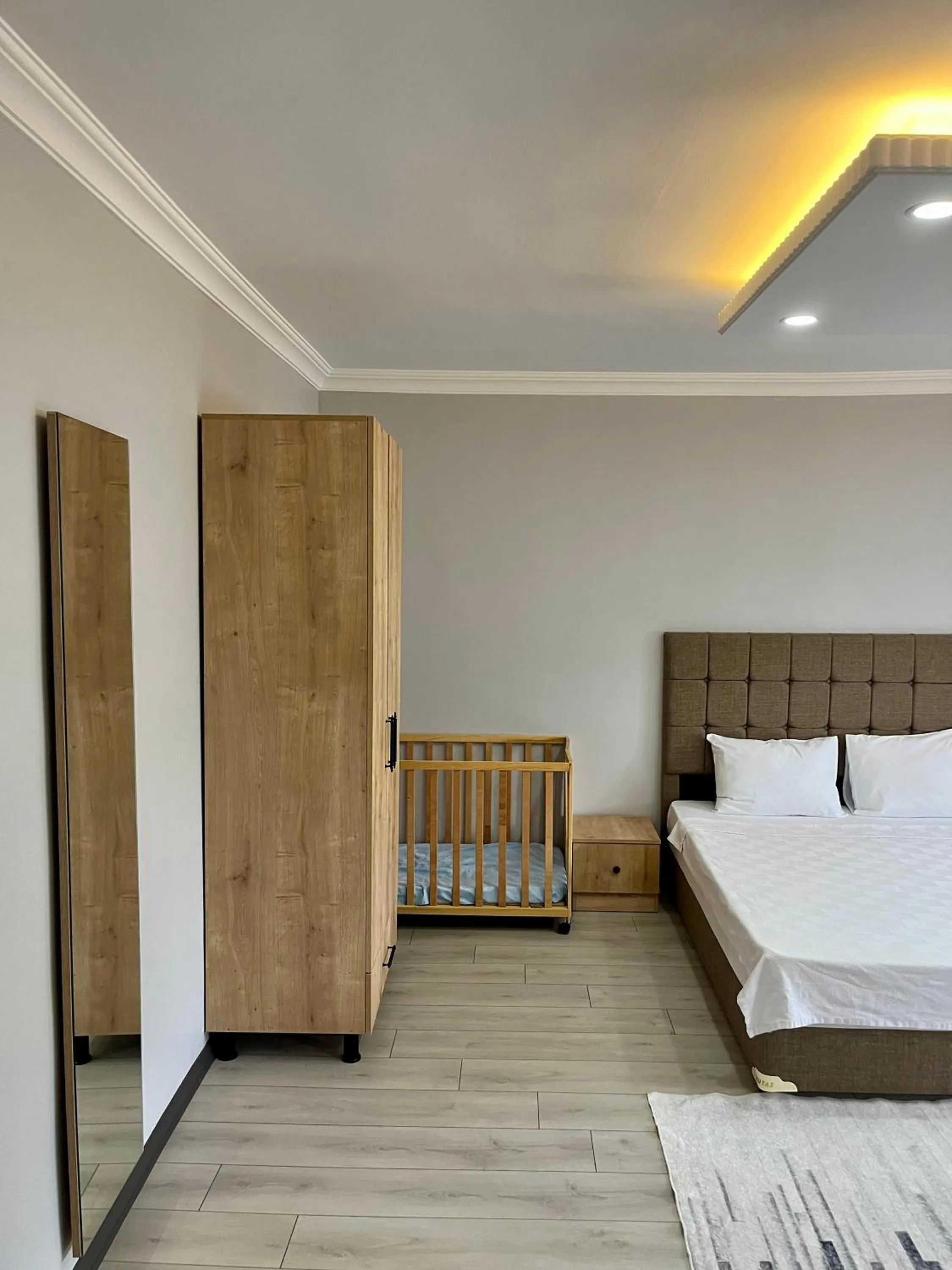 Bed in Ozn Suit Airport Hotel