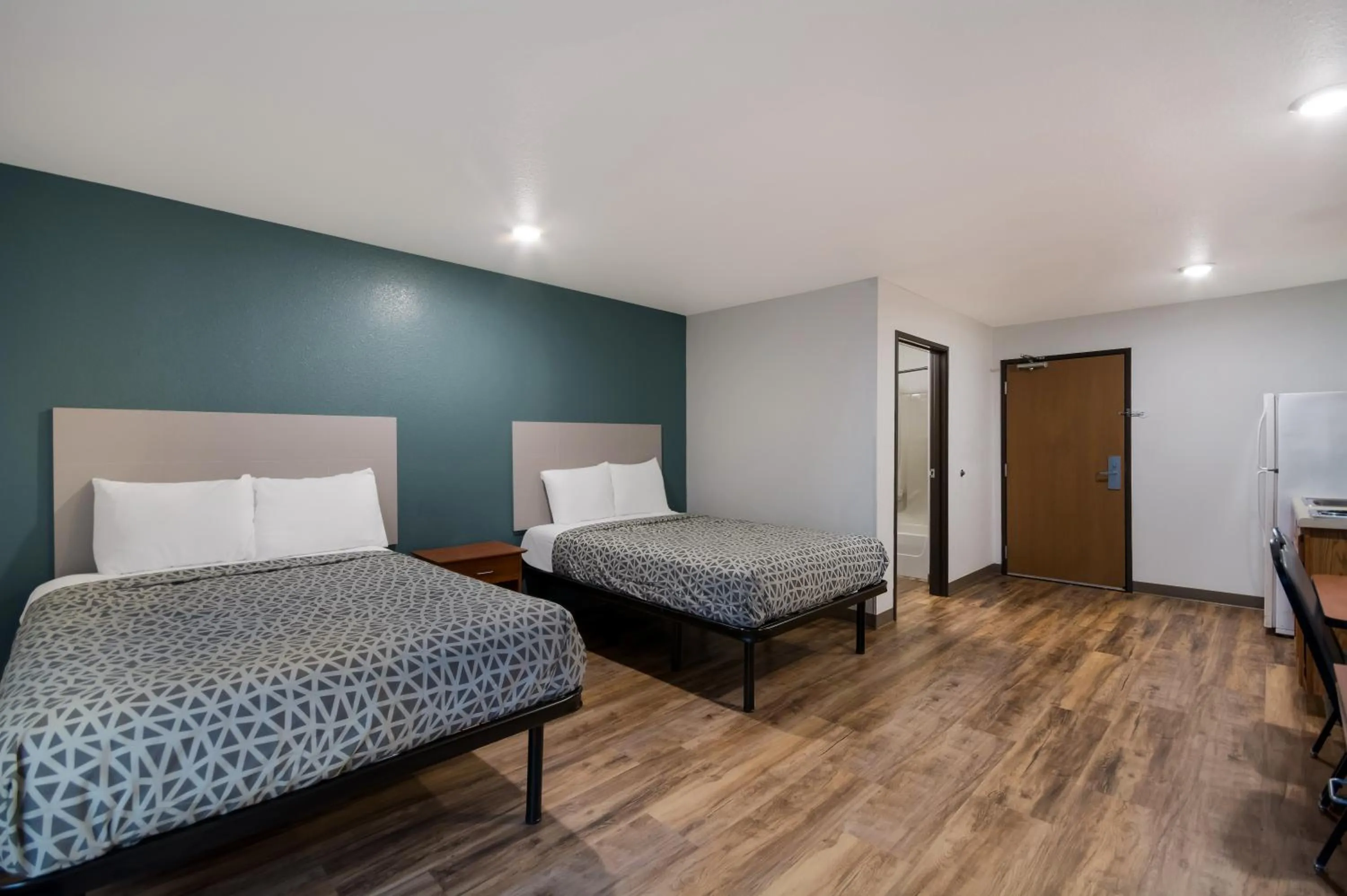 Bedroom, Bed in WoodSpring Suites Greenville Central I-85