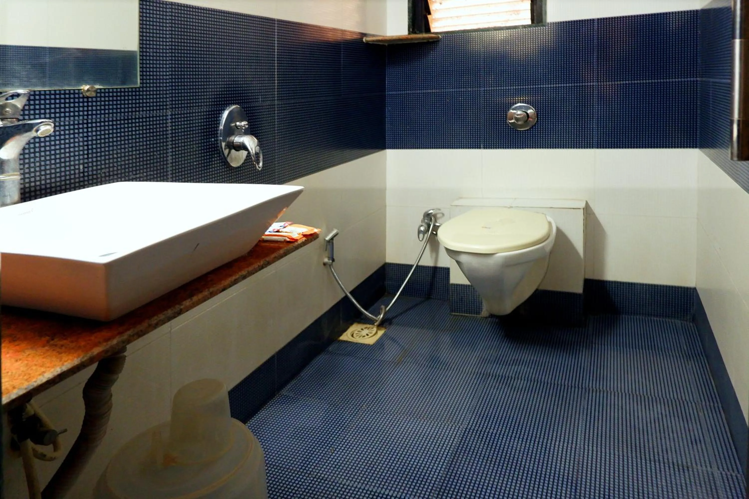 Bathroom in Hotel Sai Vijay