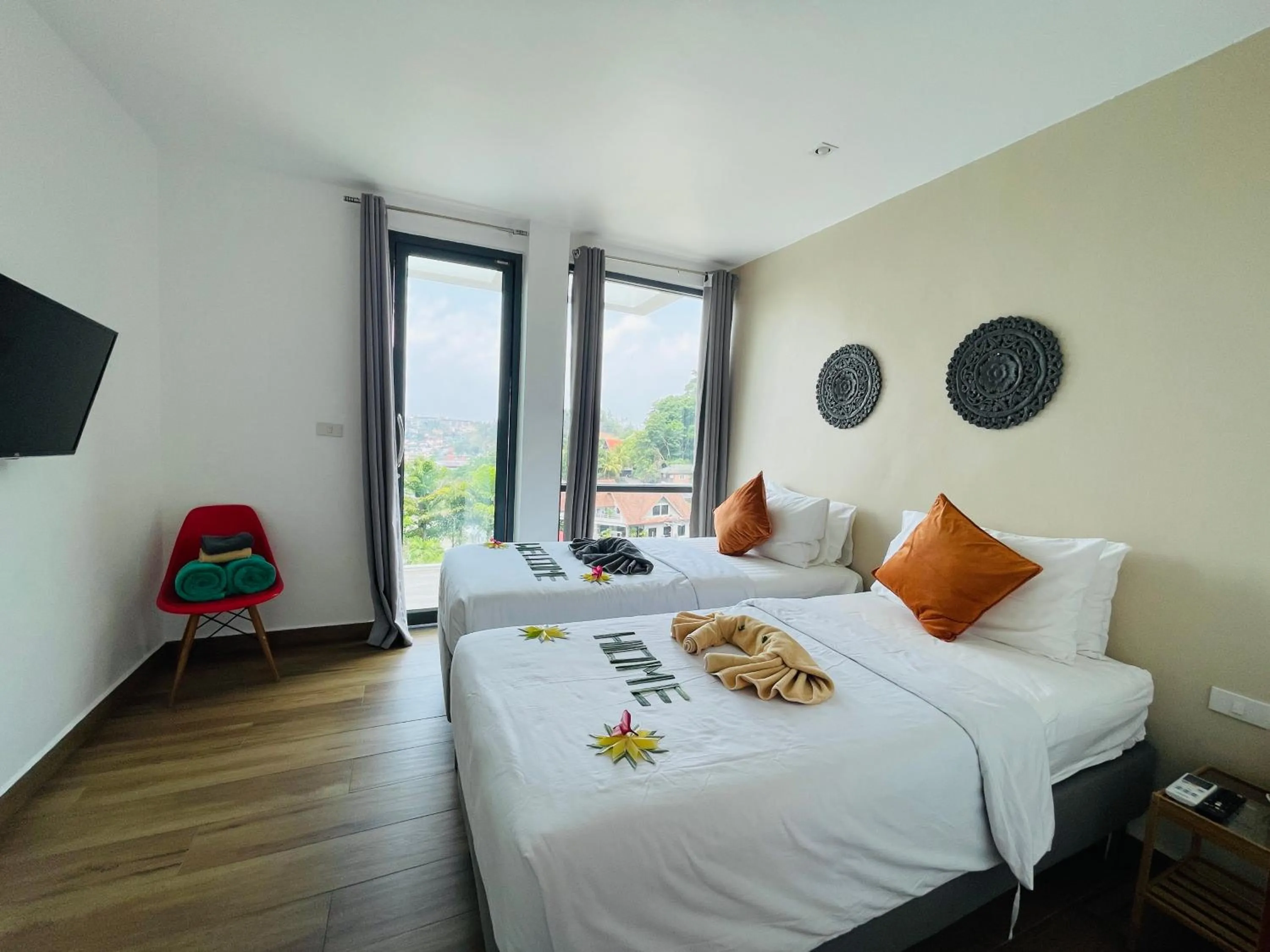 Bed in Baan Saint-Tropez Seaview Villas Kata Beach