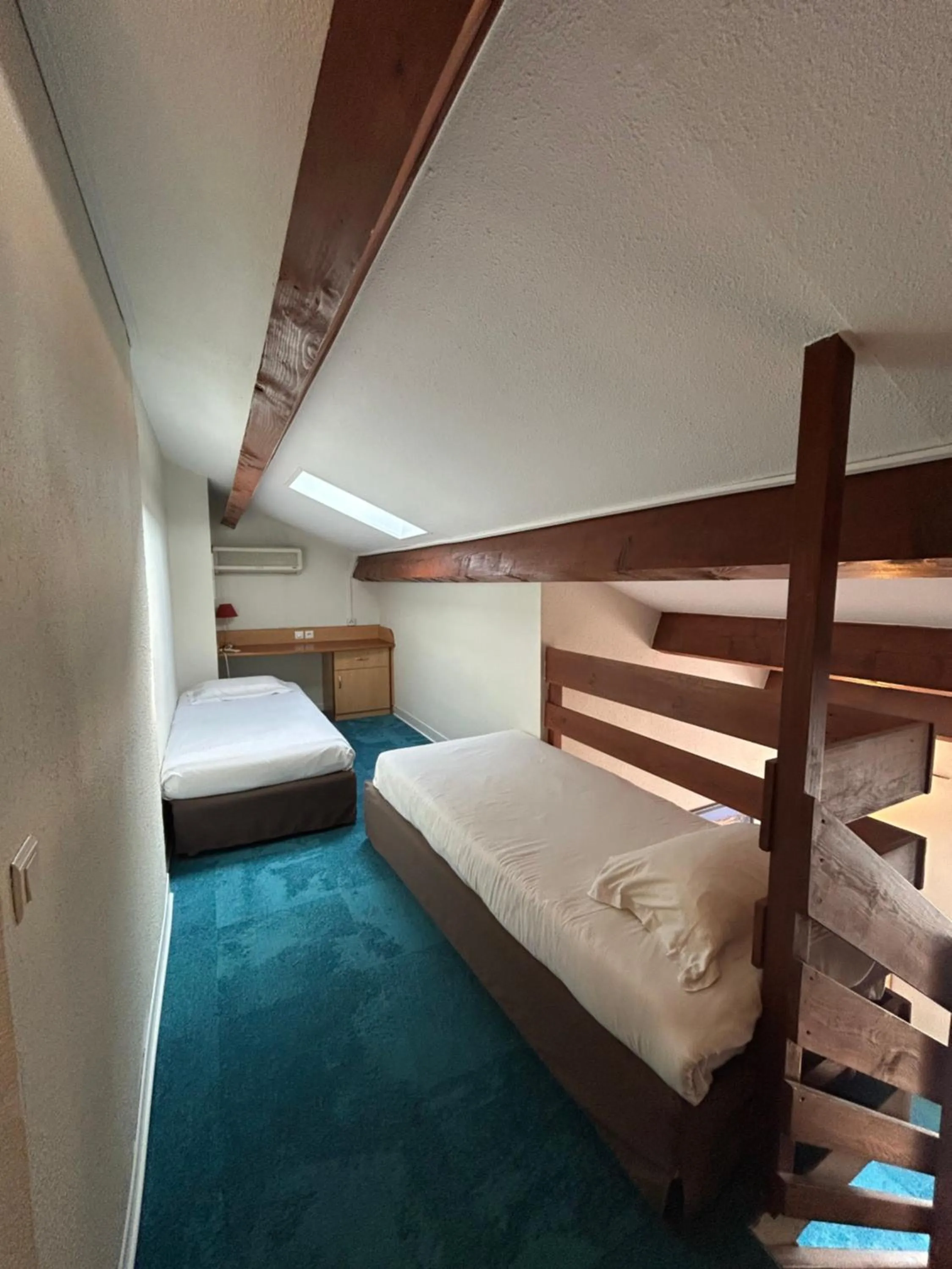 Photo of the whole room, Bed in Kyriad Montpellier Aéroport - Gare Sud de France