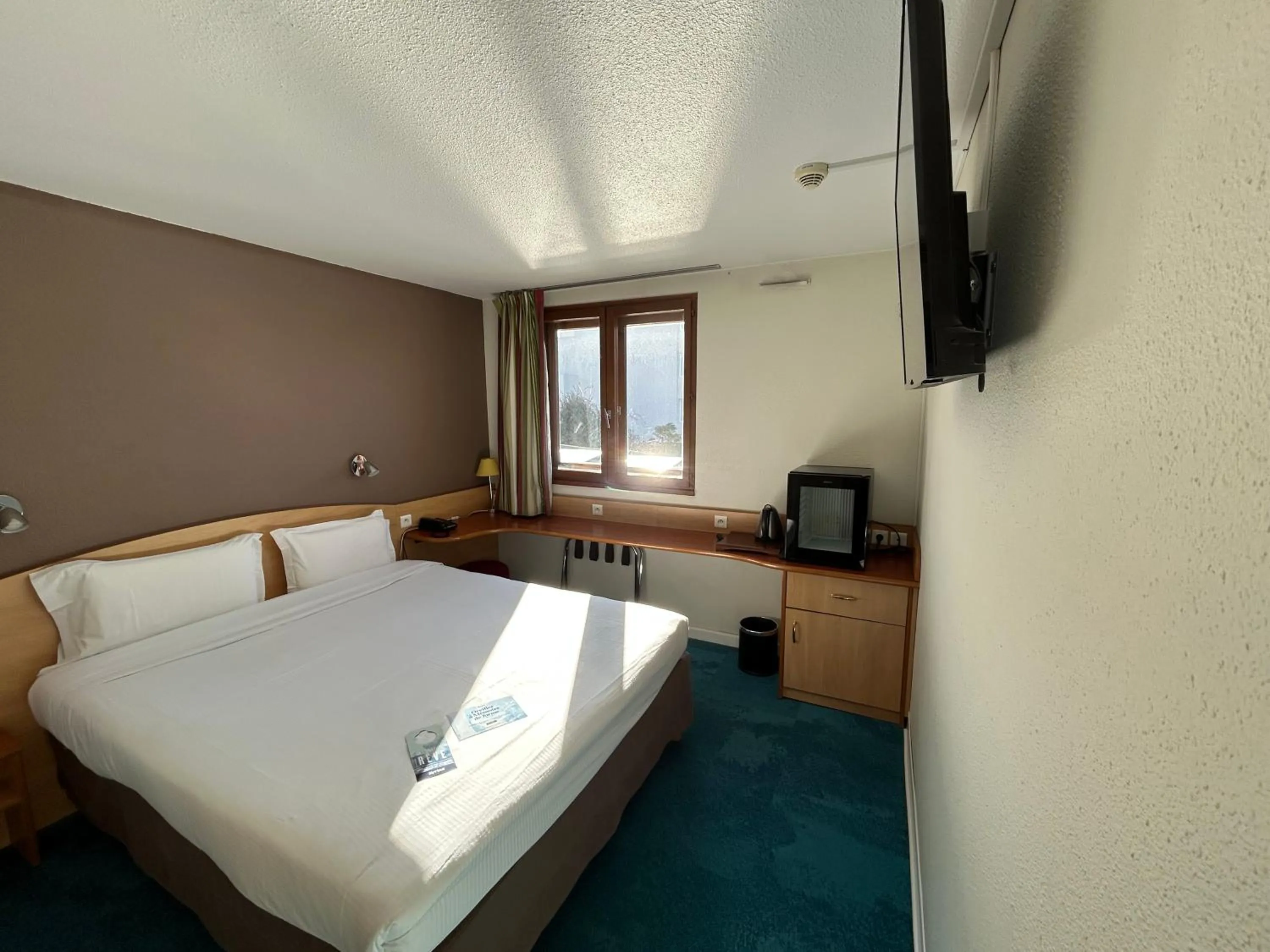 Bed in Kyriad Montpellier Aéroport - Gare Sud de France