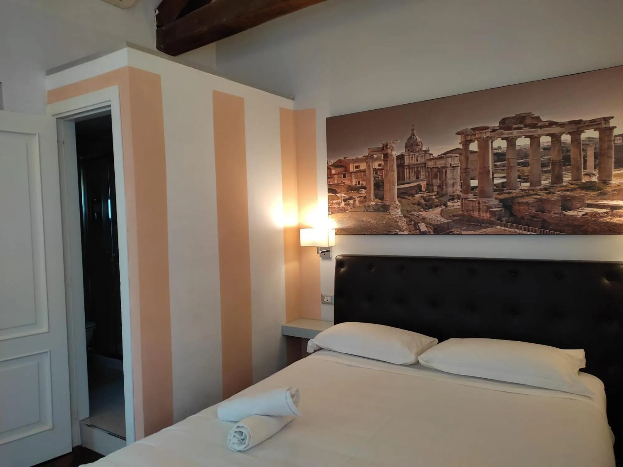 Bed in Relais Arco Della Pace