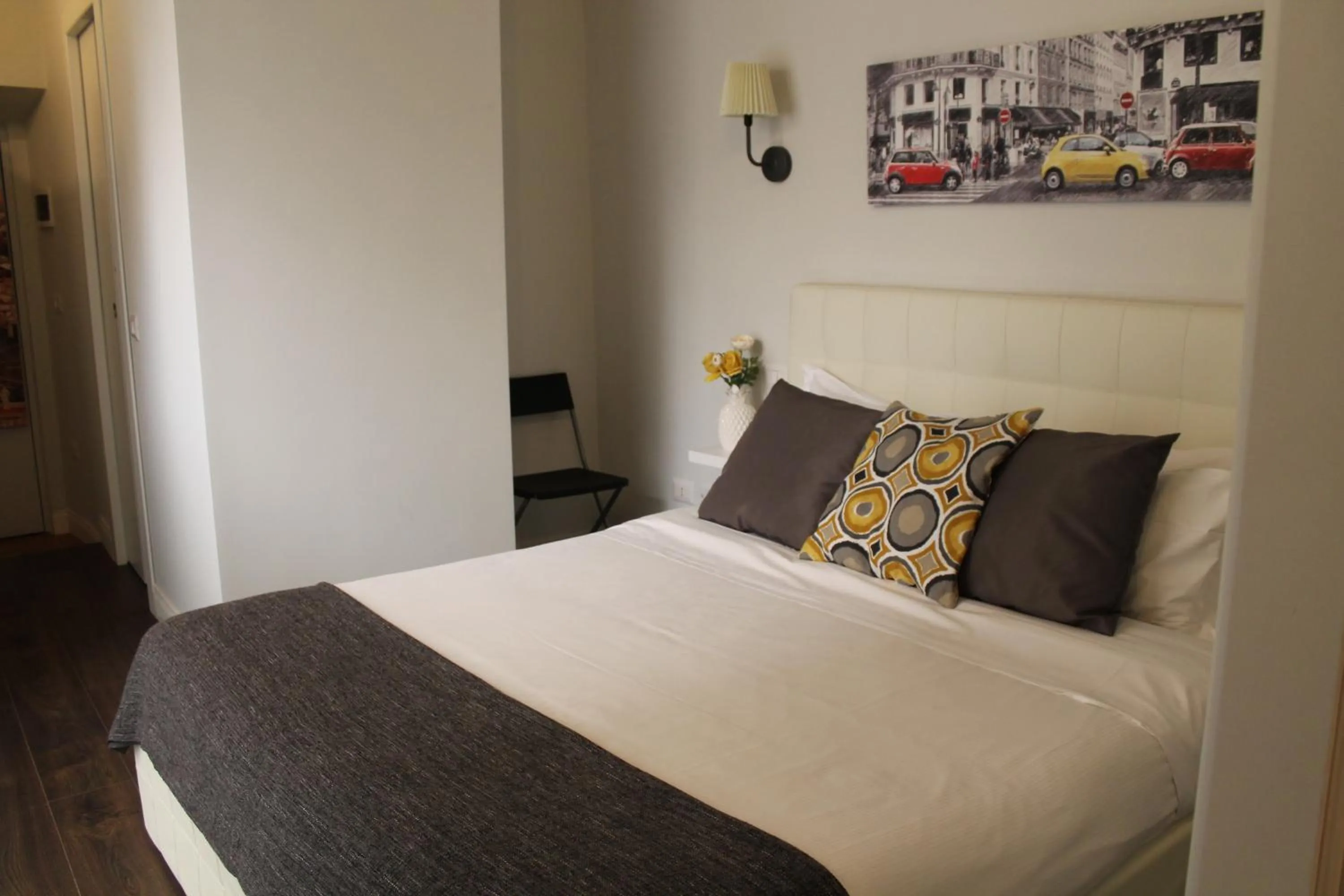 Photo of the whole room, Bed in Relais Arco Della Pace