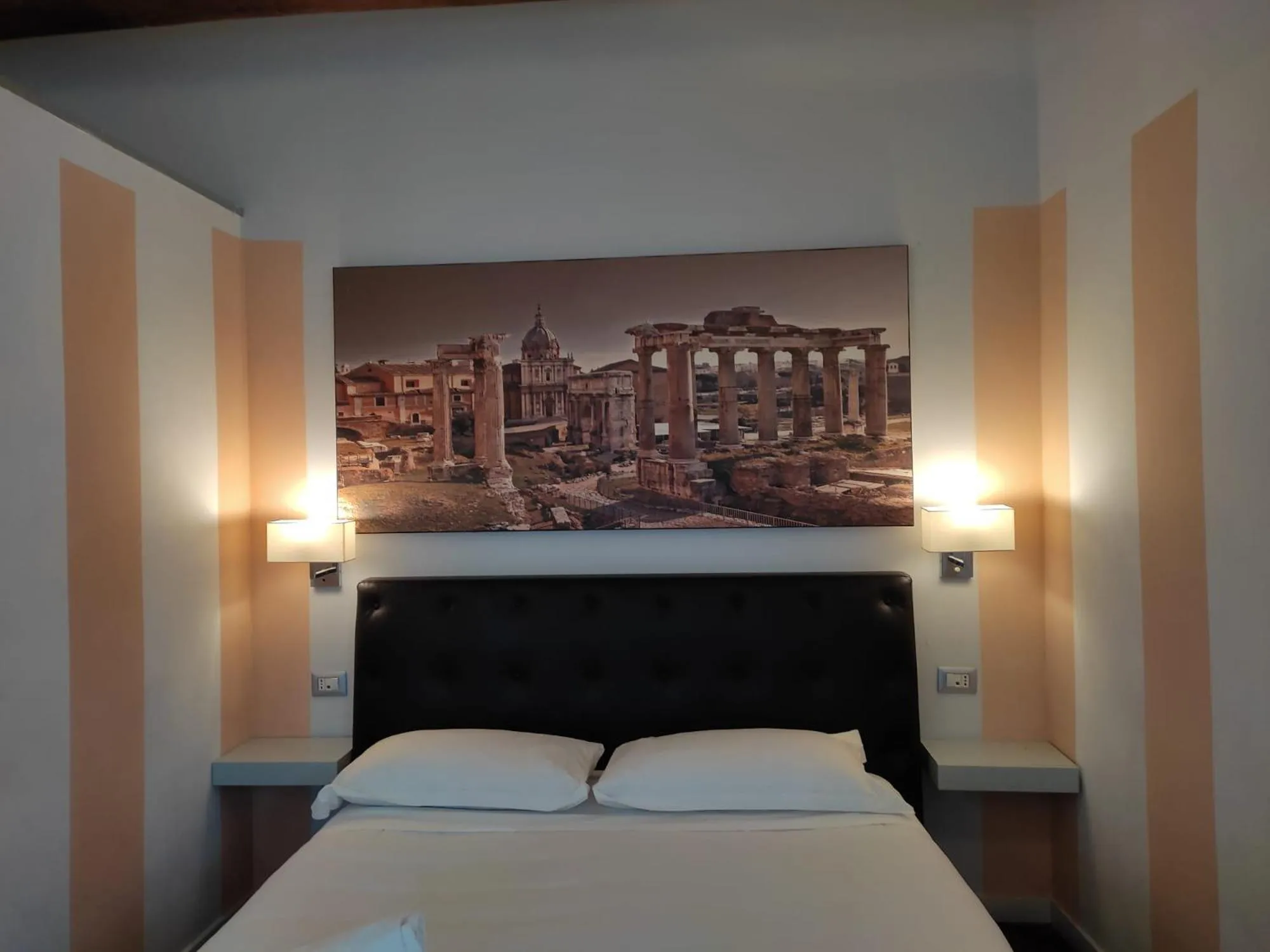 Bed in Relais Arco Della Pace