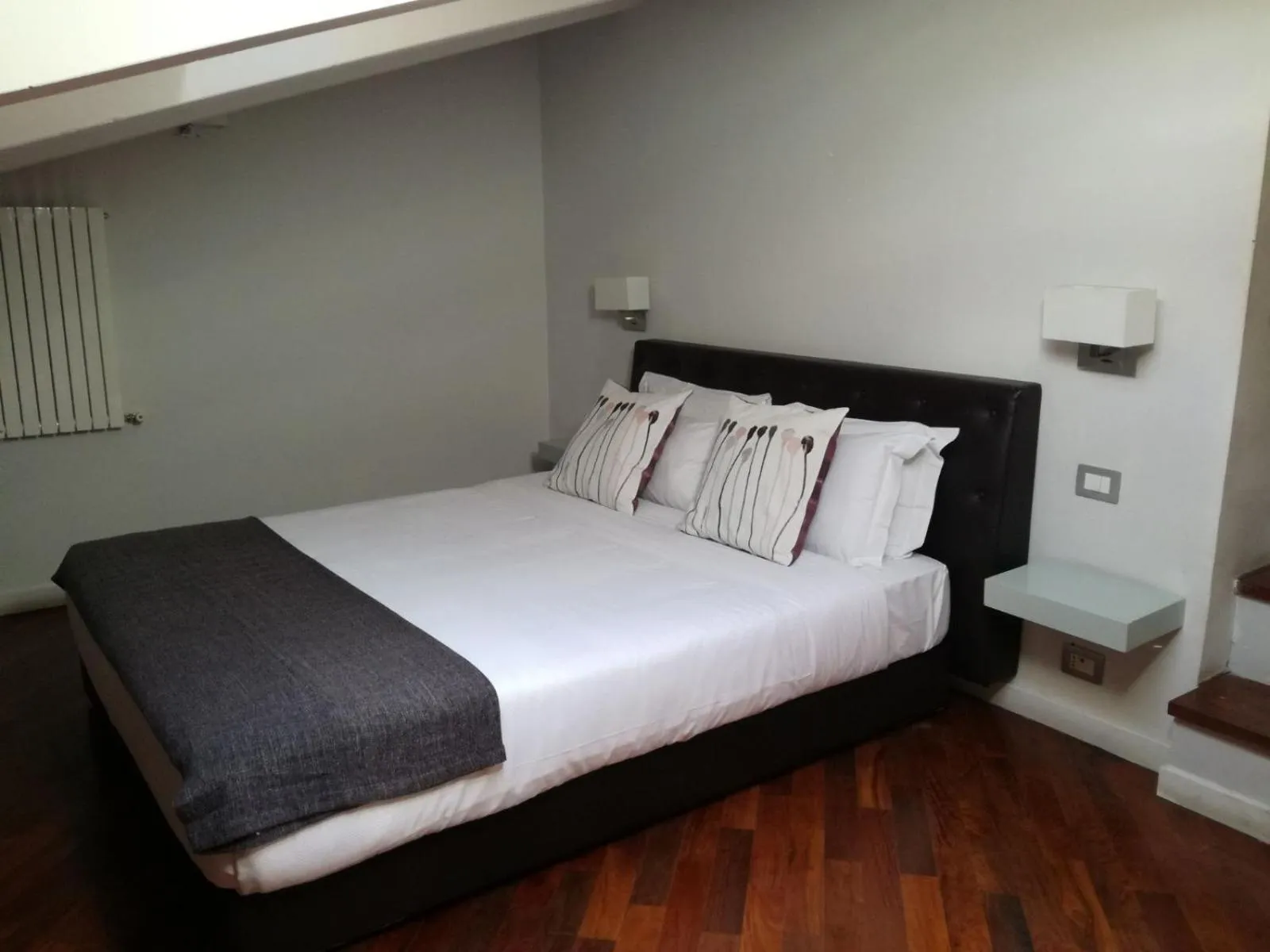 Photo of the whole room, Bed in Relais Arco Della Pace