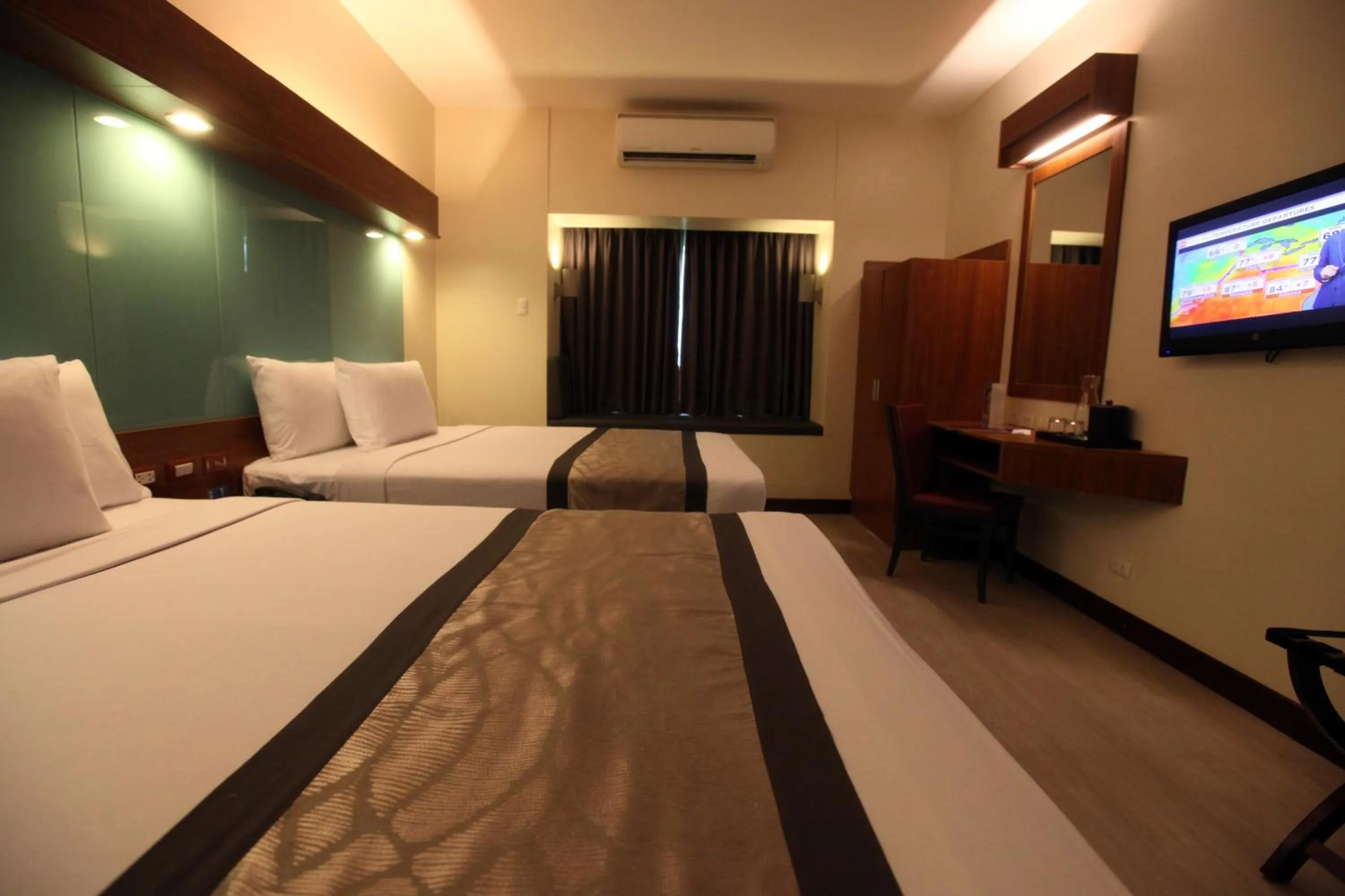 Bed in Microtel by Wyndham UP Technohub