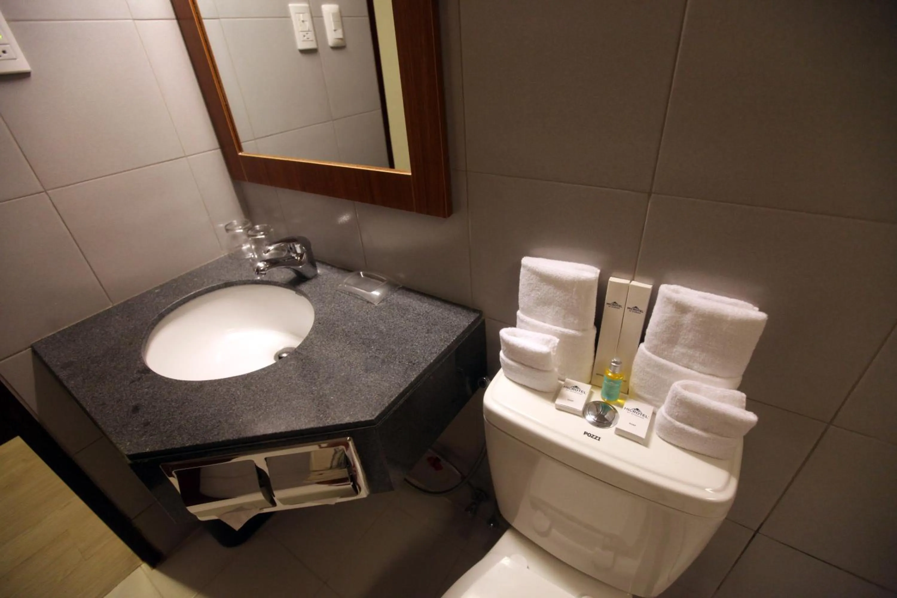 Bathroom in Microtel by Wyndham UP Technohub