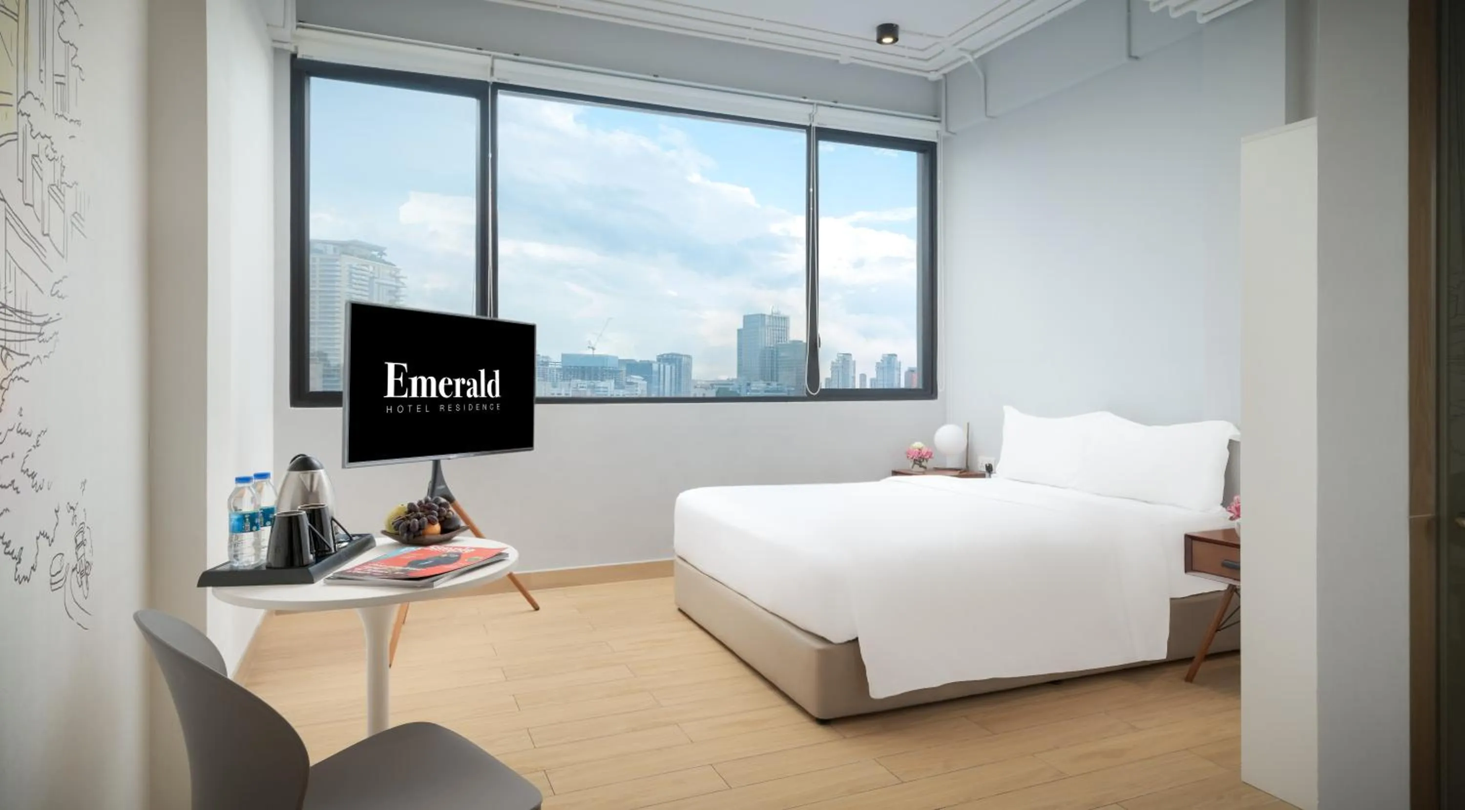 Bed in Emerald Hotel Residence