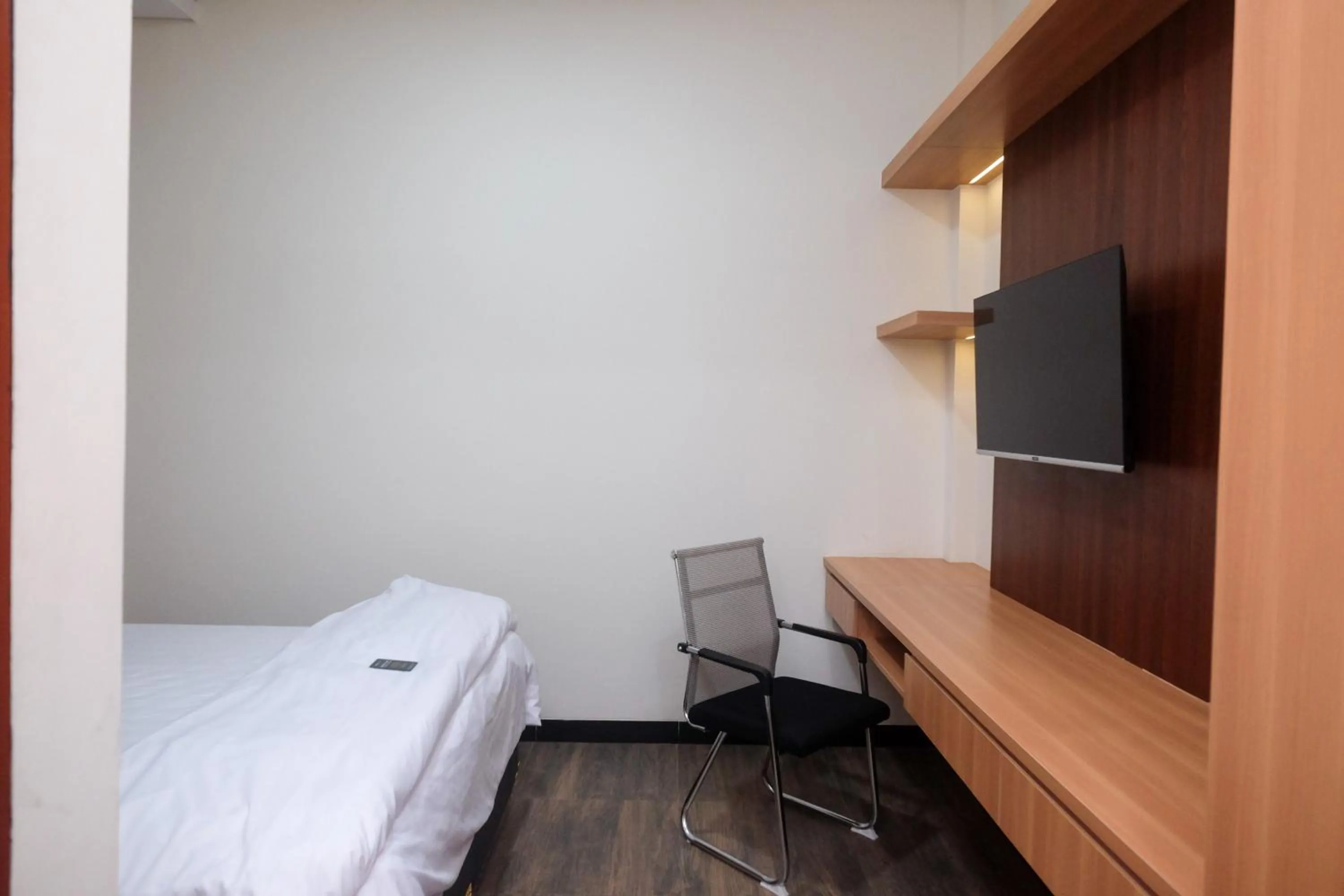 Bed in Urbanview Grand Lotus Hotel by RedDoorz