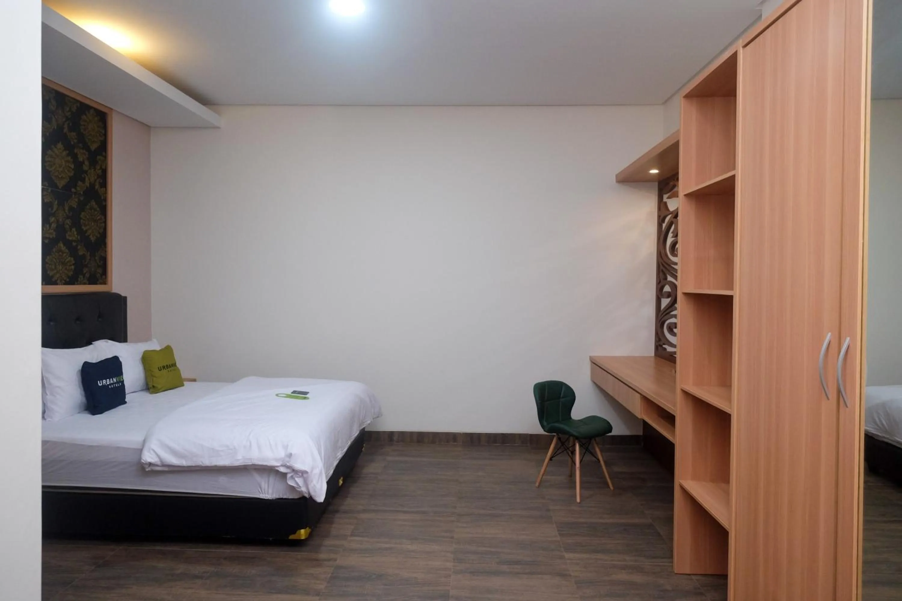 Bed in Urbanview Grand Lotus Hotel by RedDoorz