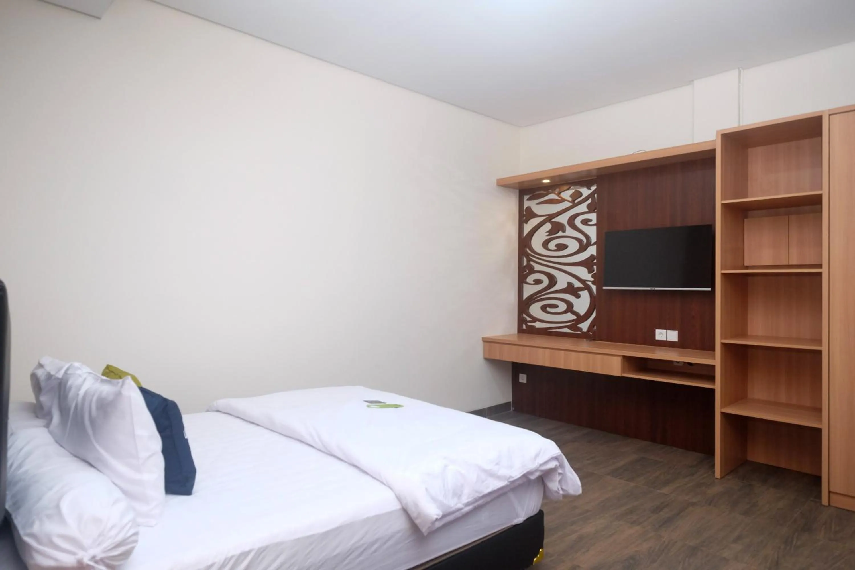 Bed in Urbanview Grand Lotus Hotel by RedDoorz