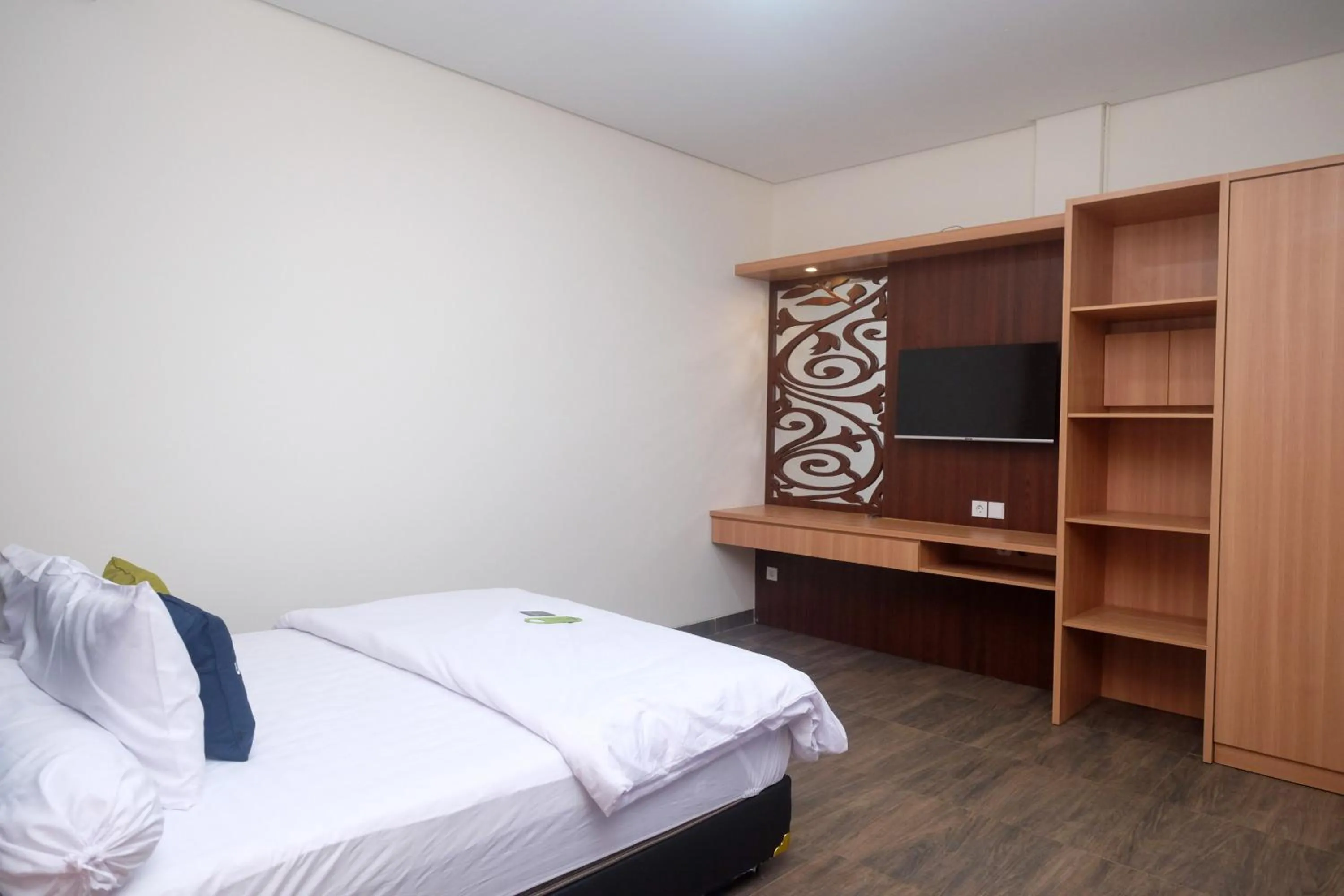 Bed in Urbanview Grand Lotus Hotel by RedDoorz