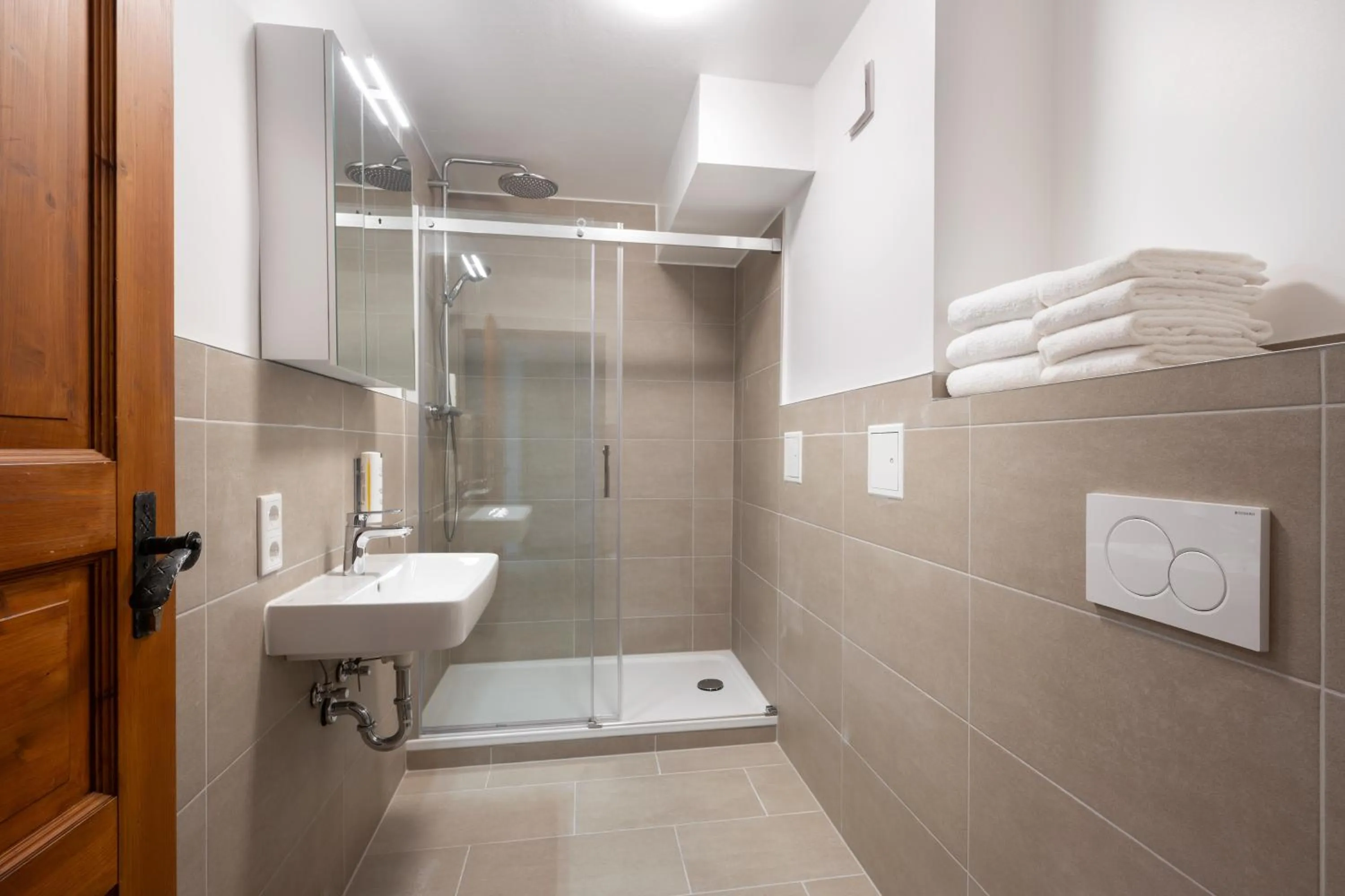 Shower in Homaris Apartments München Laim