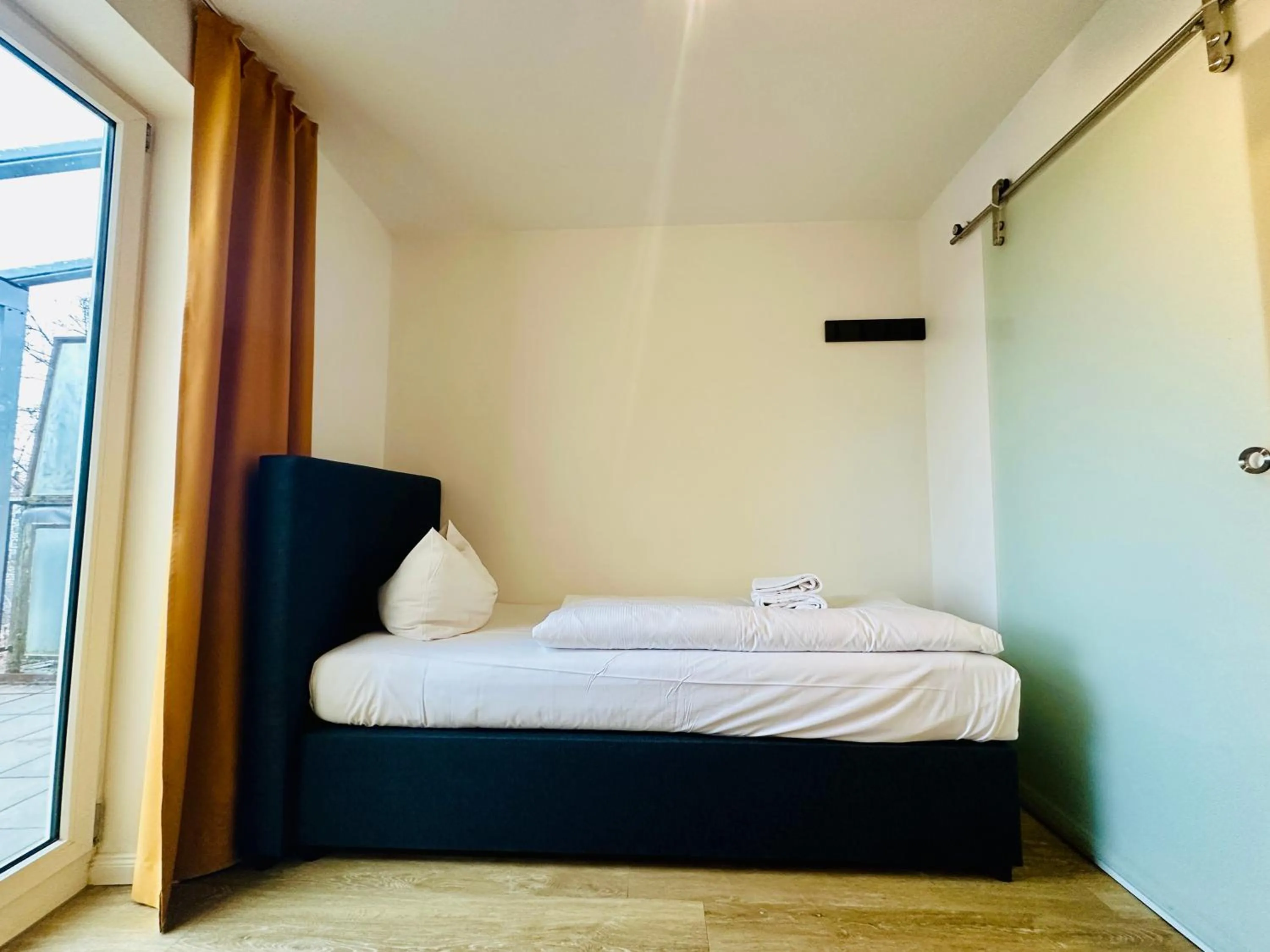 Bed in Homaris Apartments München Laim