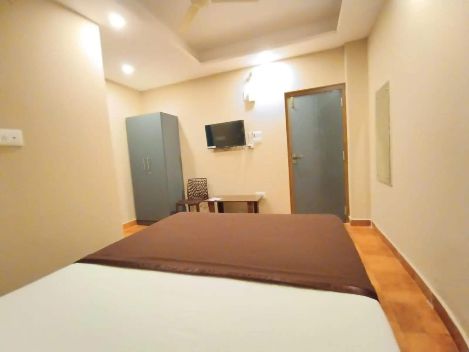 Bed in The Nisarga Residency