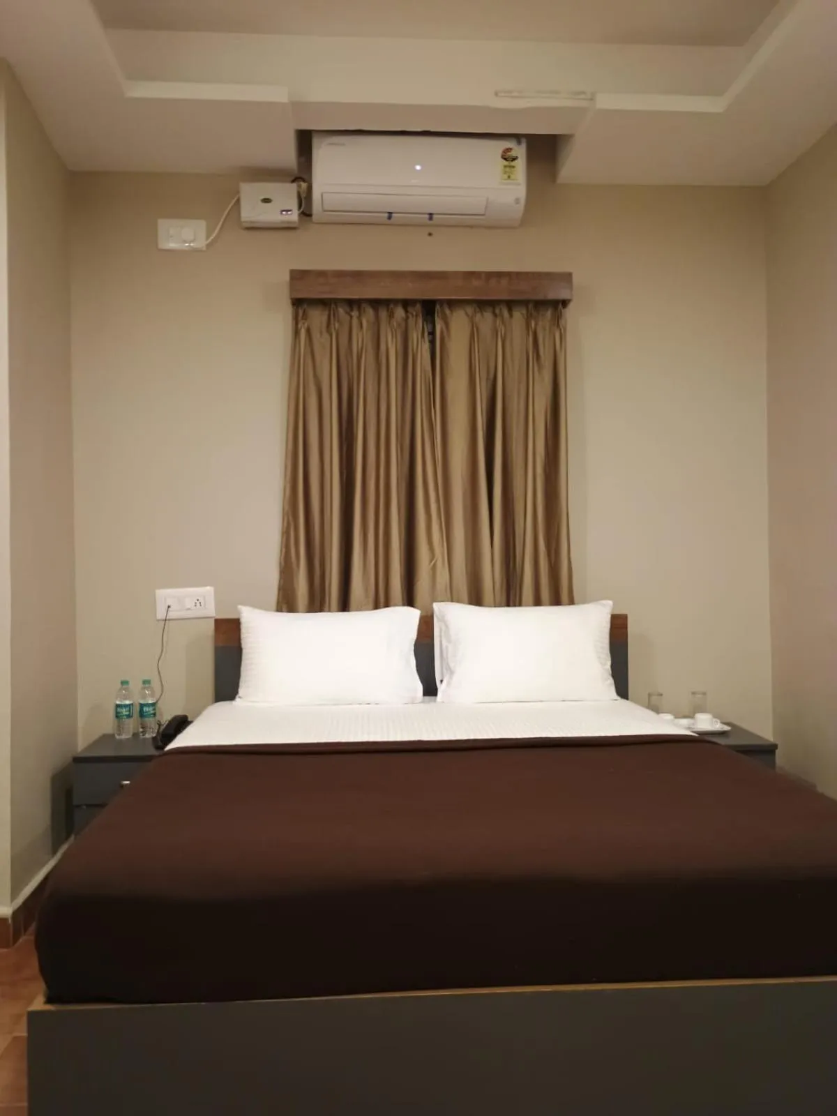 Bed in The Nisarga Residency