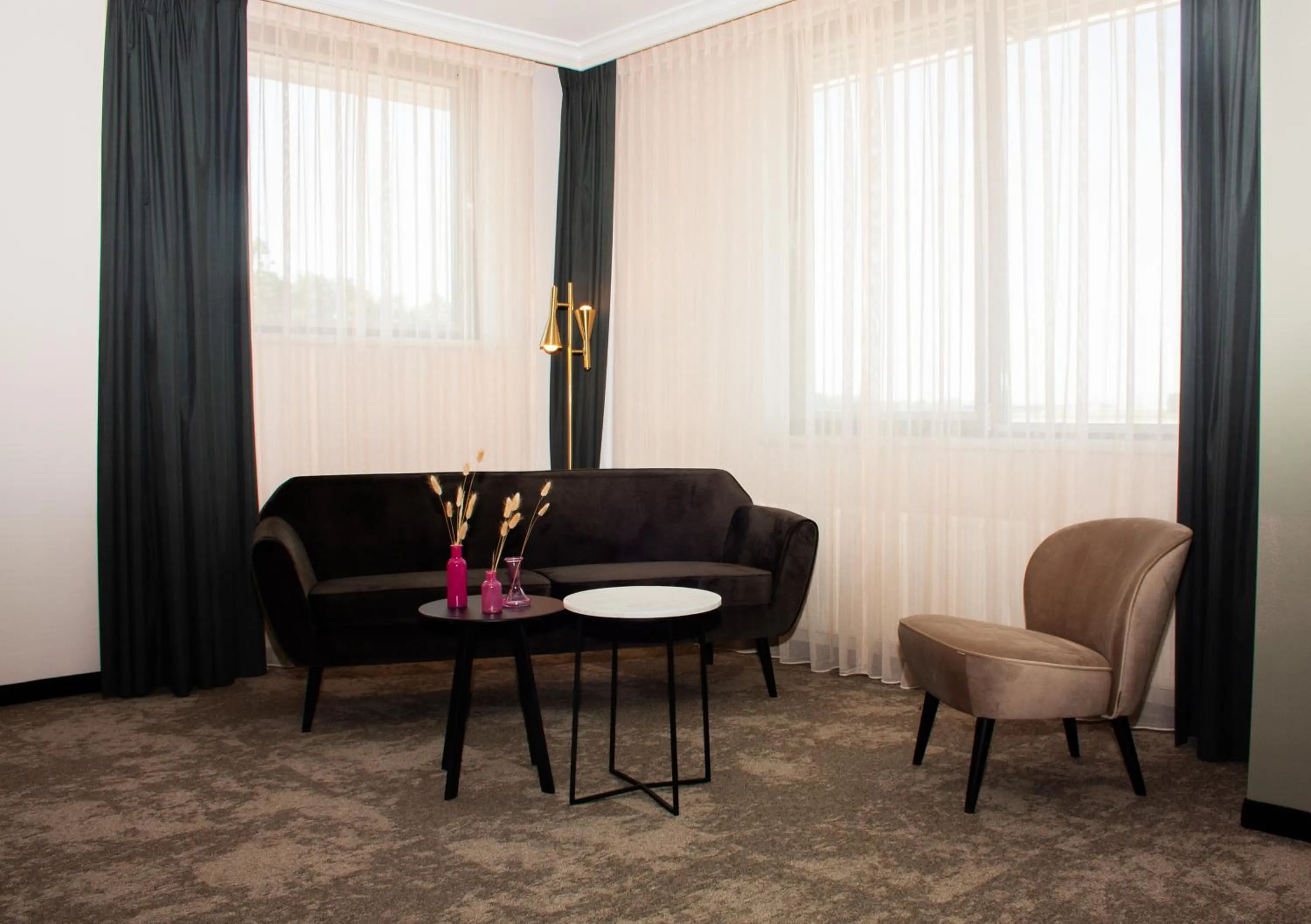 Seating area in Fletcher Hotel-Restaurant Zevenbergen-Moerdijk