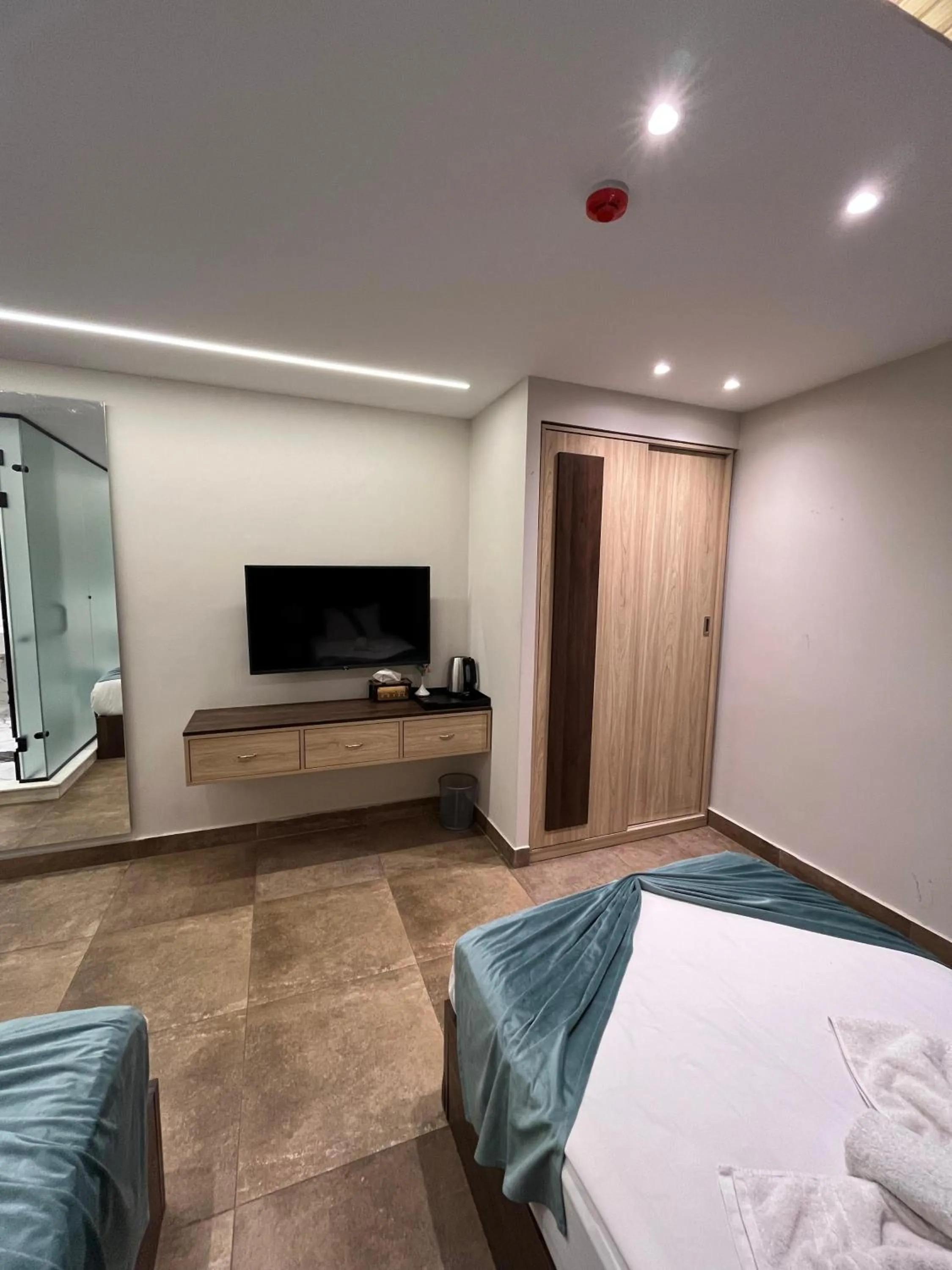 Bed in Blue Pyramids Eyes Hotel