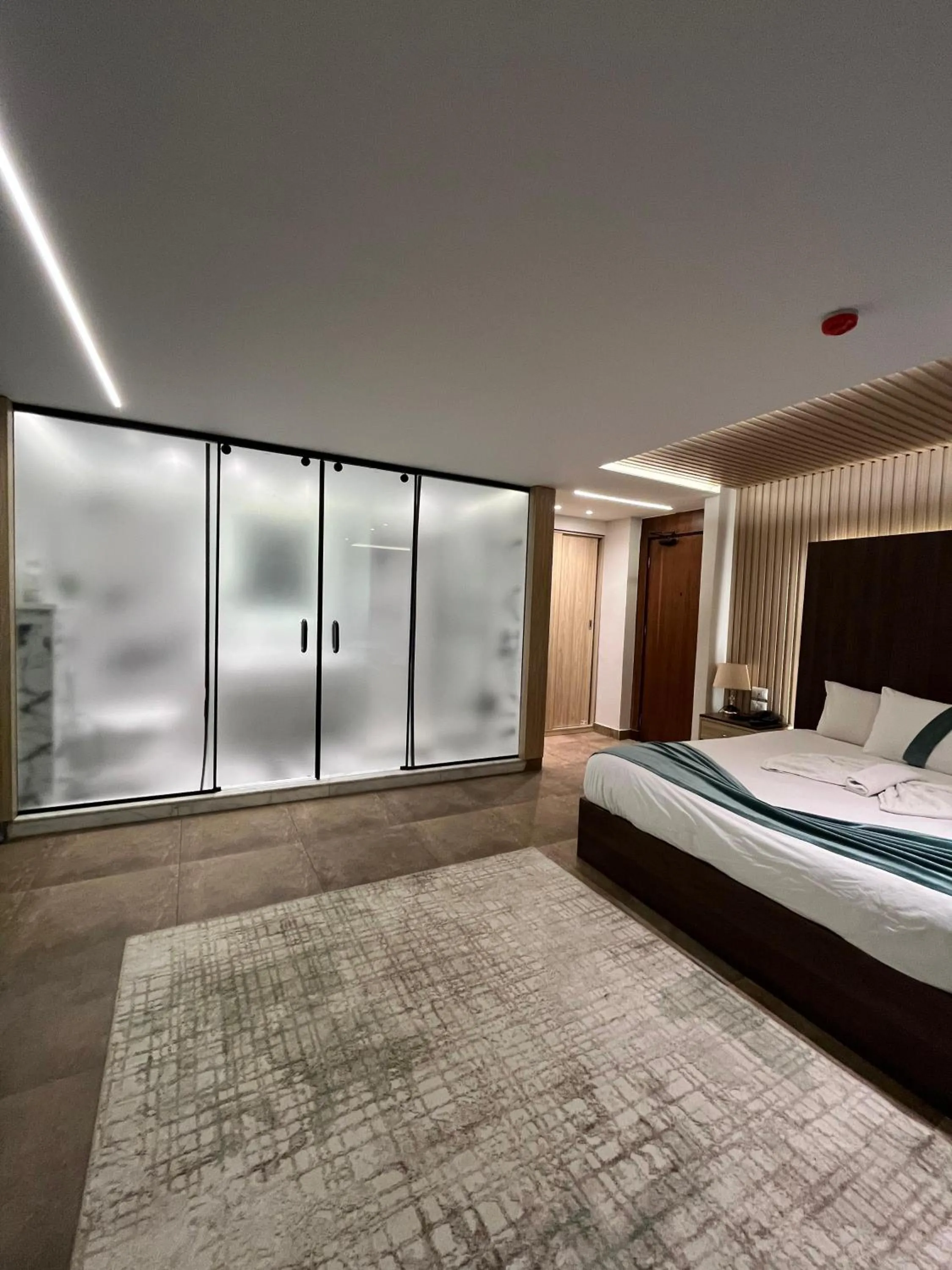 Bed in Blue Pyramids Eyes Hotel