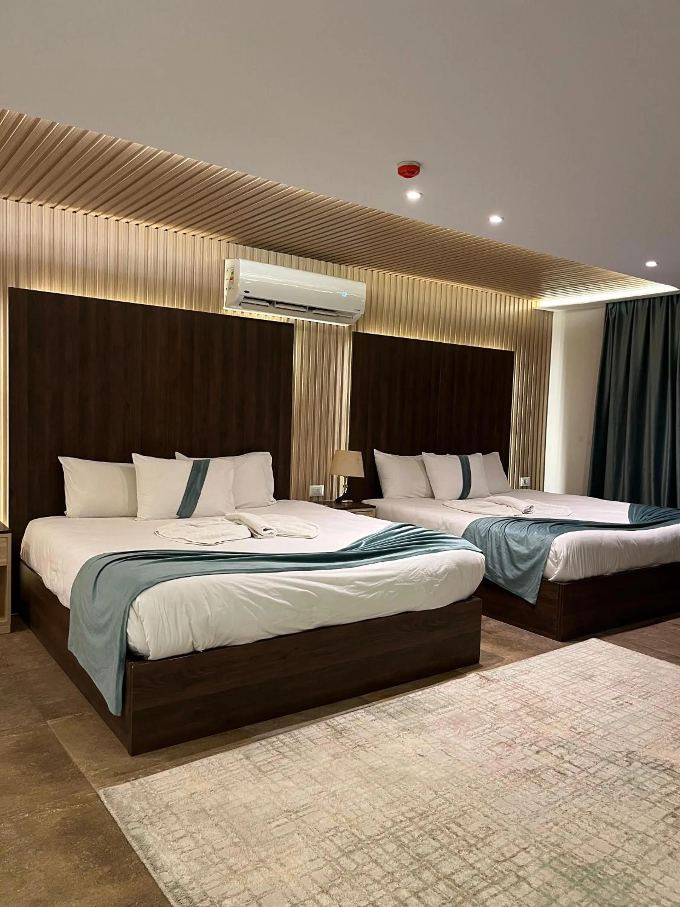 Bed in Blue Pyramids Eyes Hotel