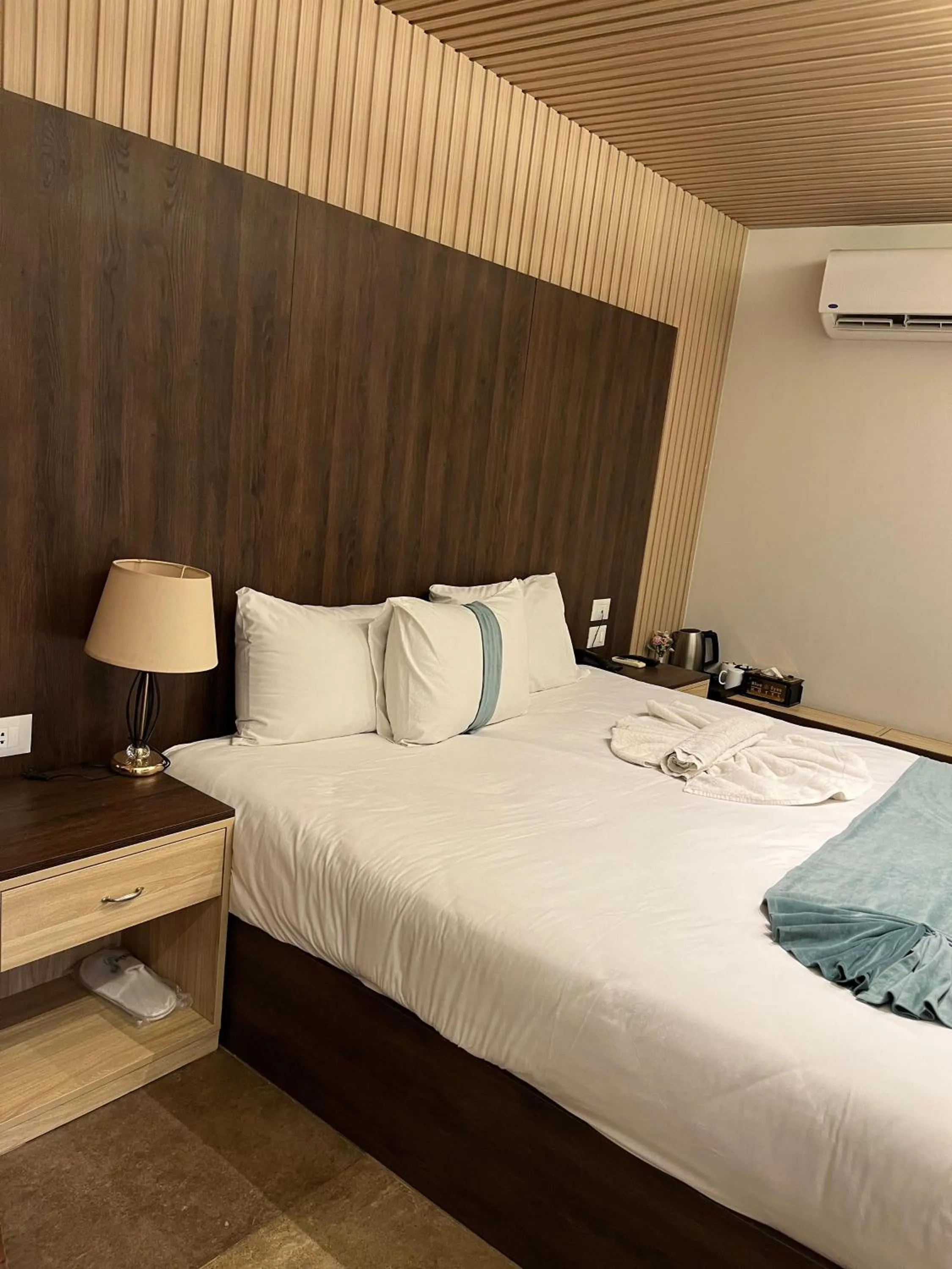 Bed in Blue Pyramids Eyes Hotel