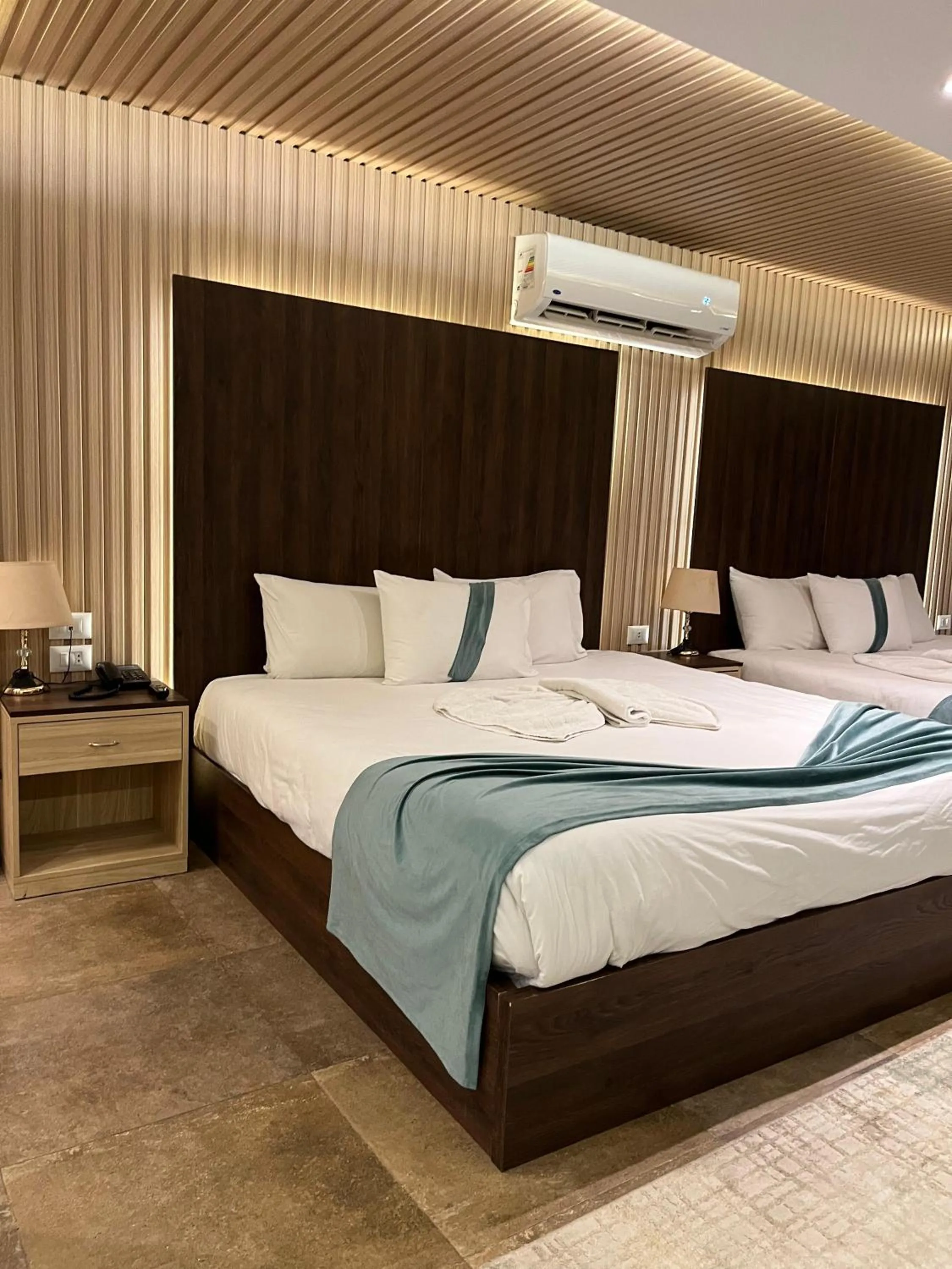 Bed in Blue Pyramids Eyes Hotel