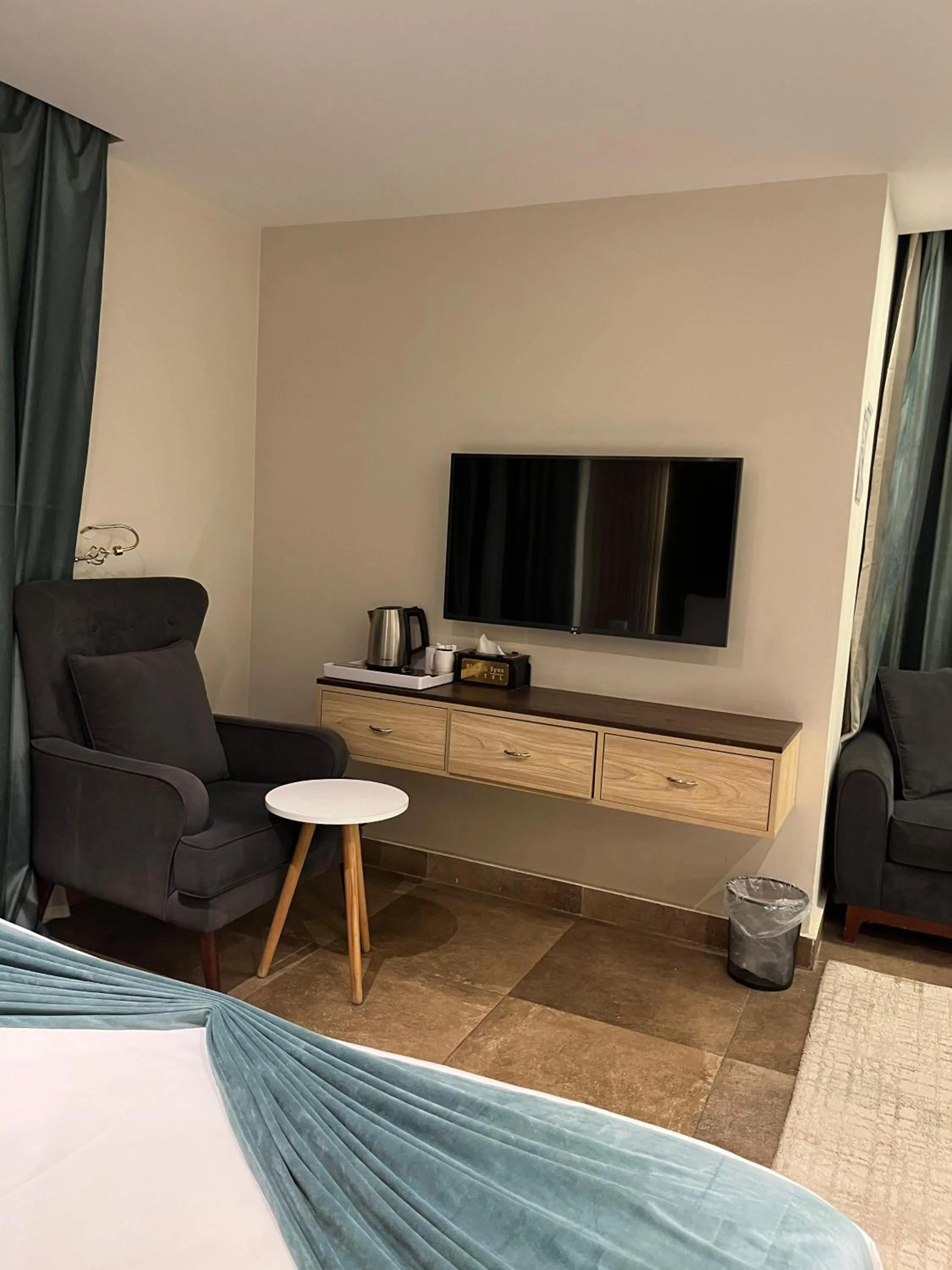 Bed in Blue Pyramids Eyes Hotel