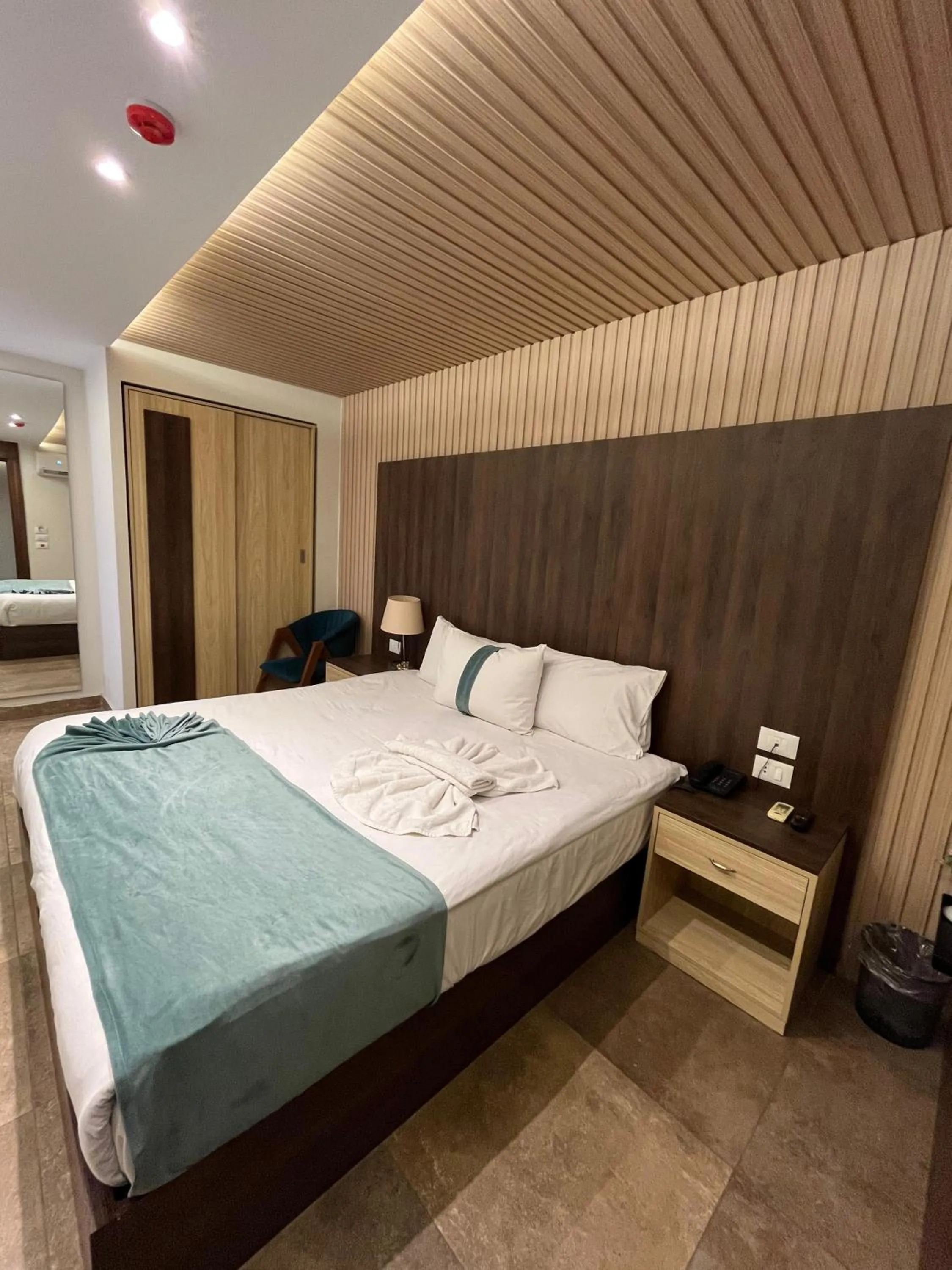 Bed in Blue Pyramids Eyes Hotel