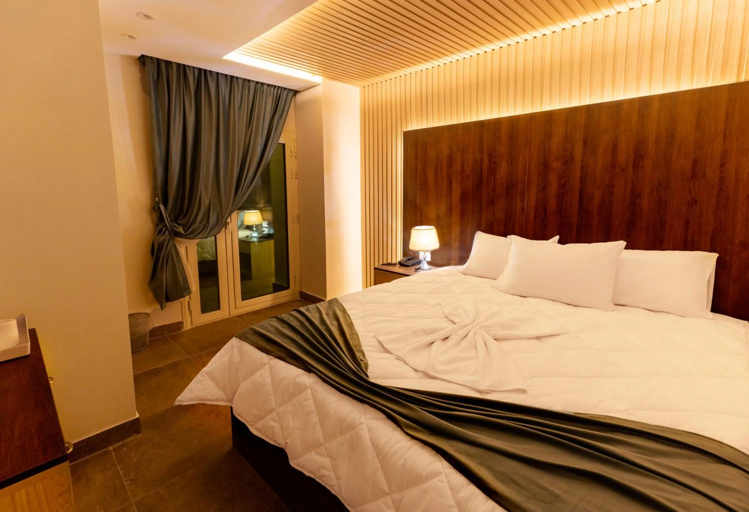 Bed in Blue Pyramids Eyes Hotel