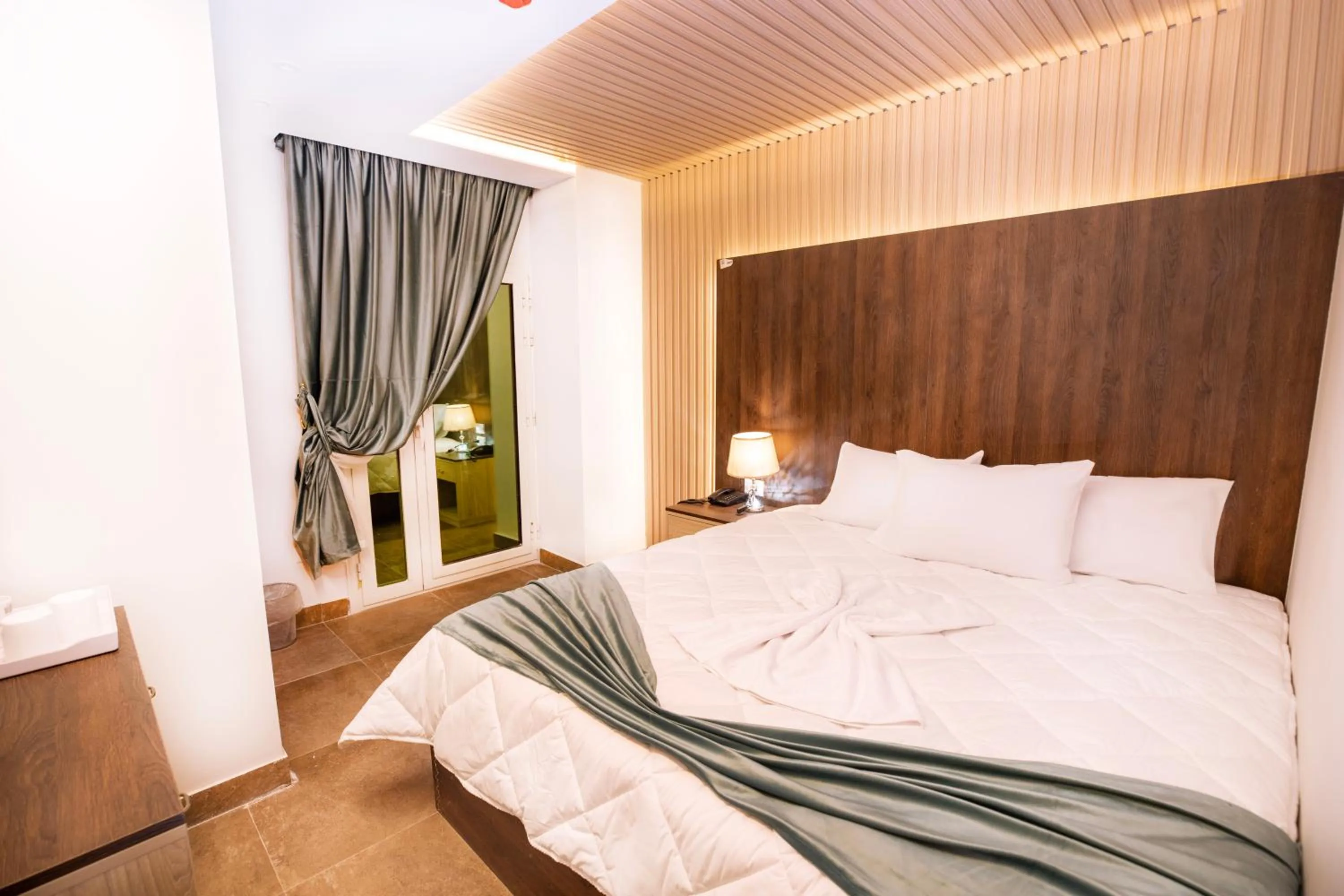 Bed in Blue Pyramids Eyes Hotel