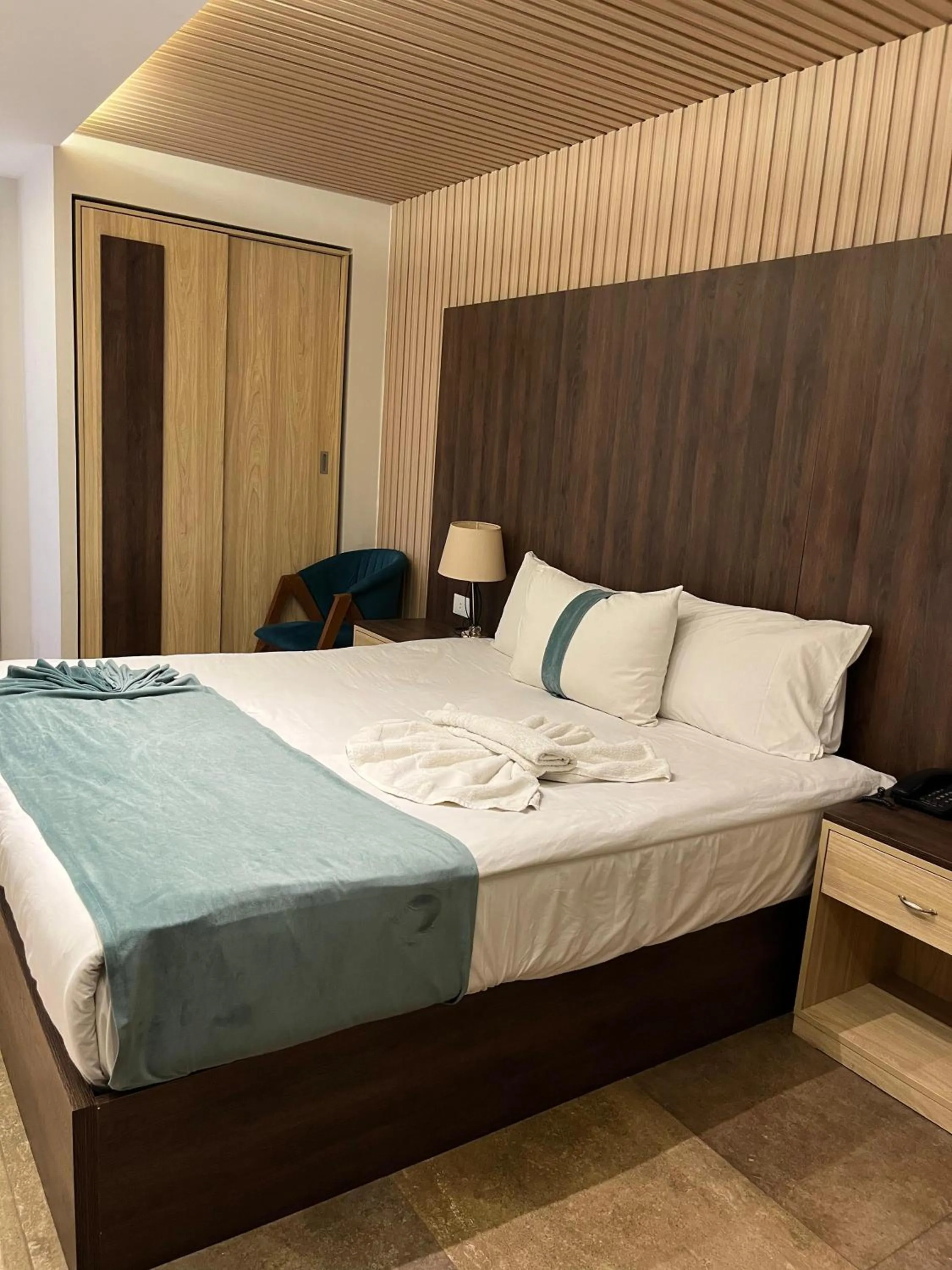 Bed in Blue Pyramids Eyes Hotel