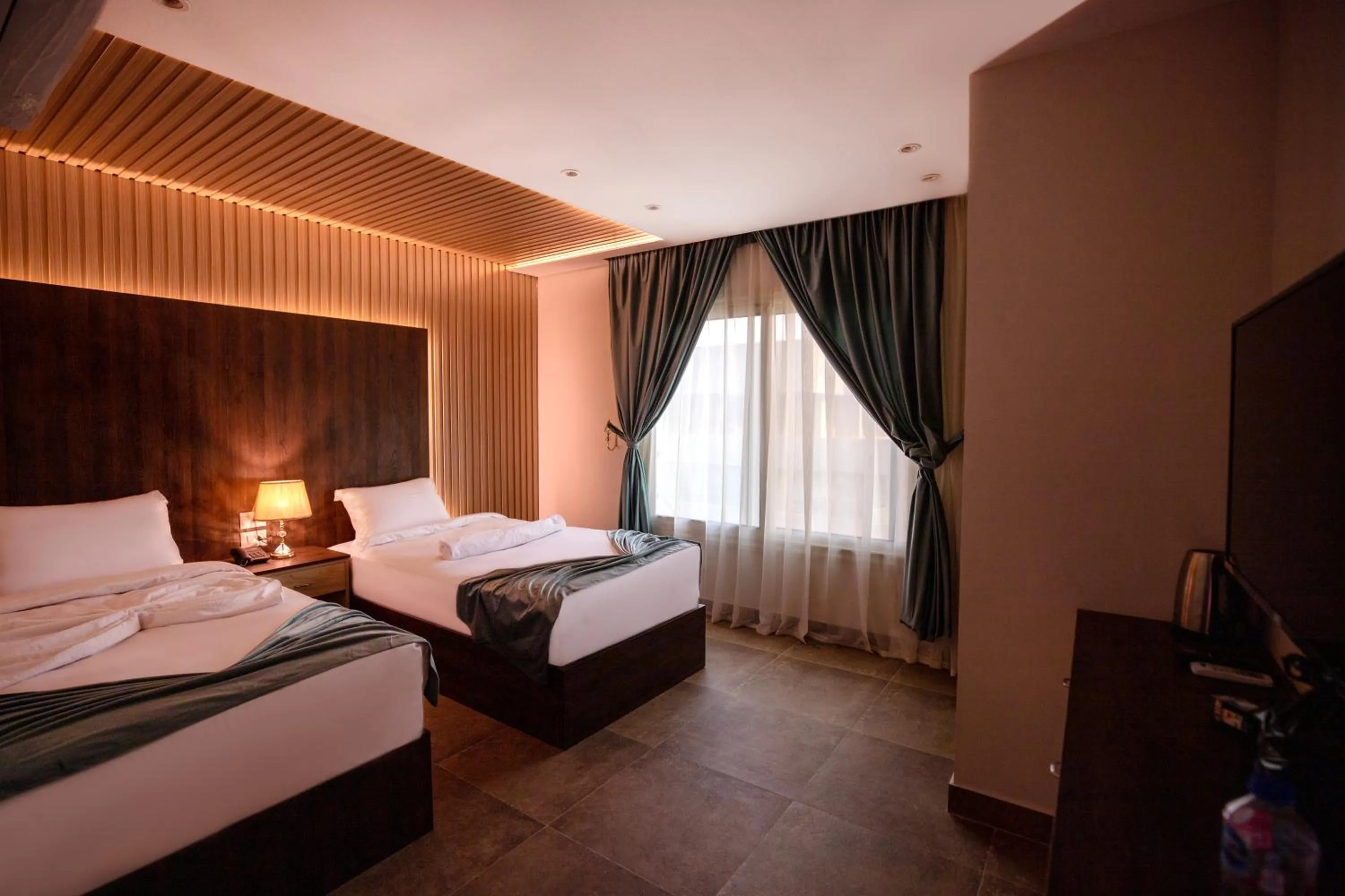 Bed in Blue Pyramids Eyes Hotel