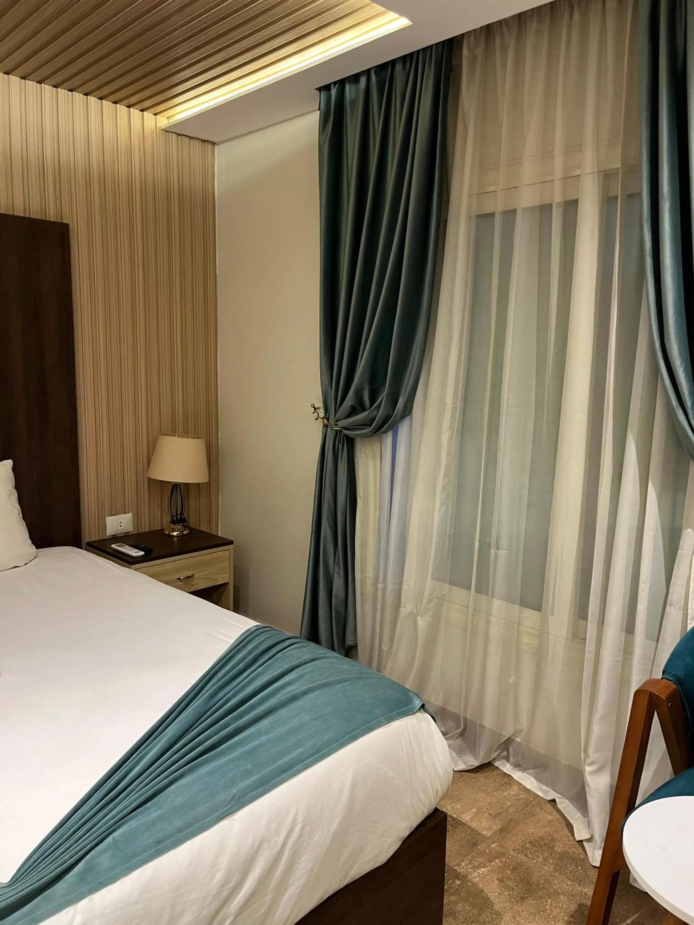 Bed in Blue Pyramids Eyes Hotel